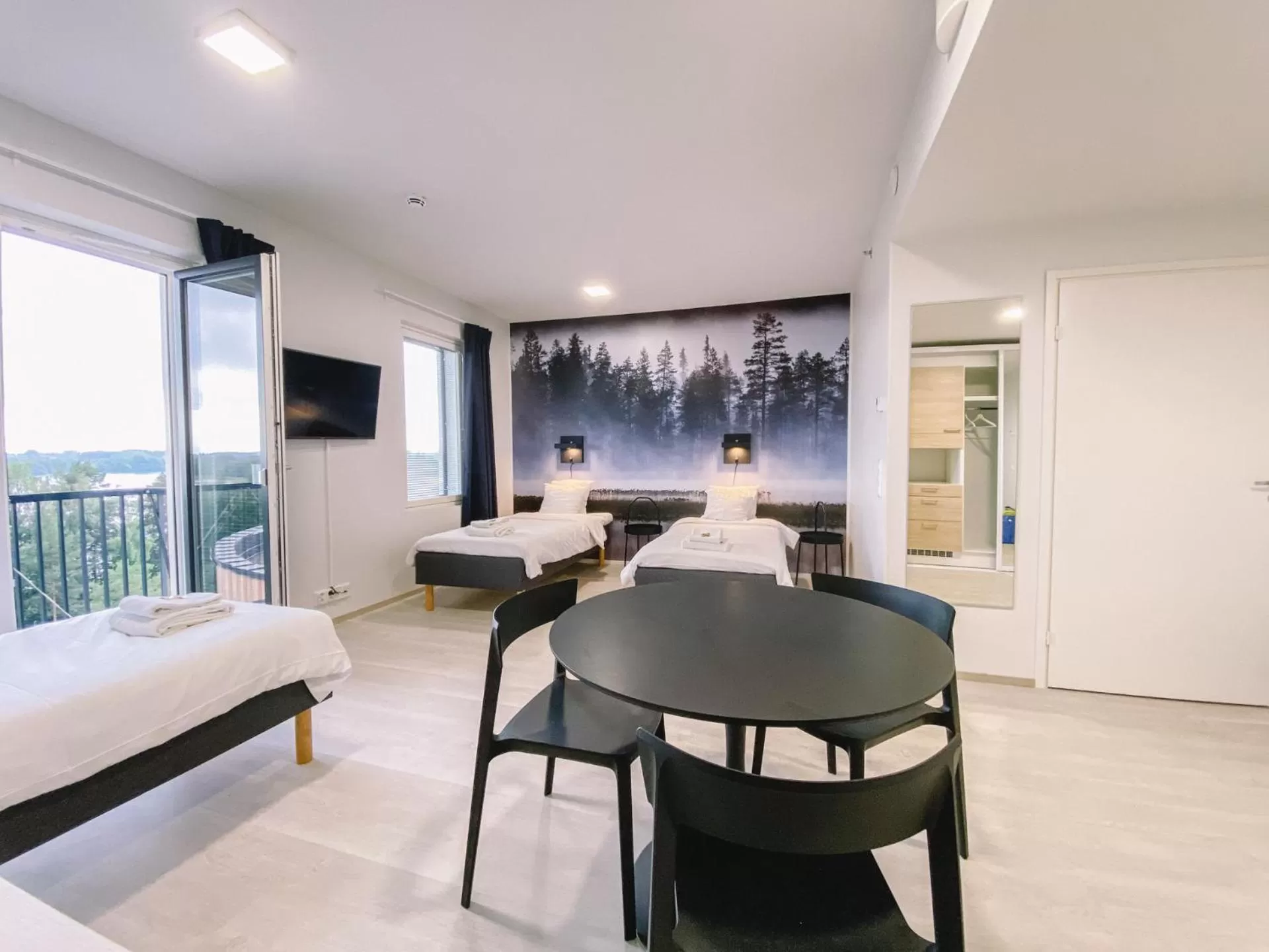 Bed in Hotelli Kuohu Kangasala - Hotel and Apartments by UHANDA