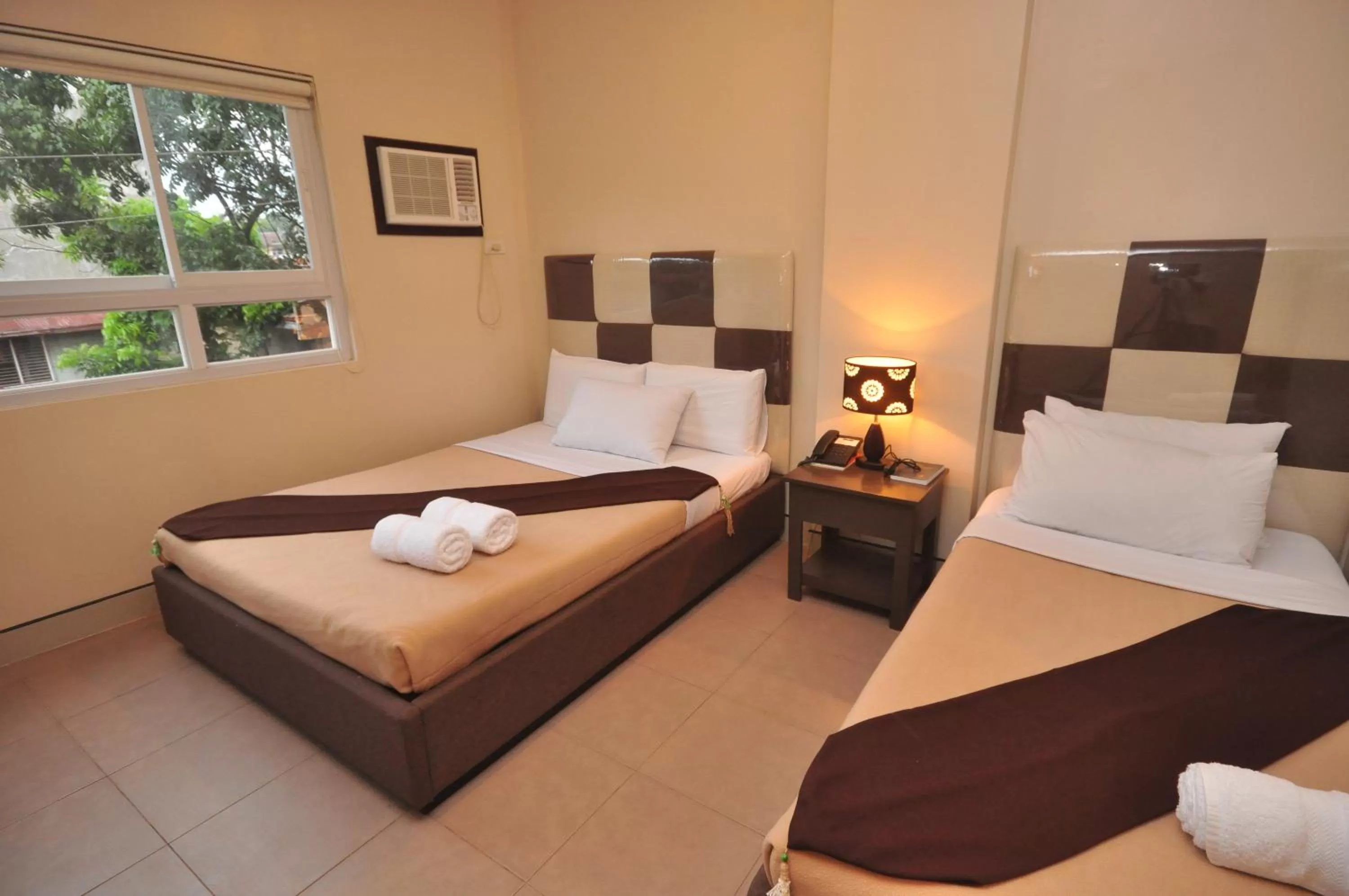 Bed in Grande Vista Hotel