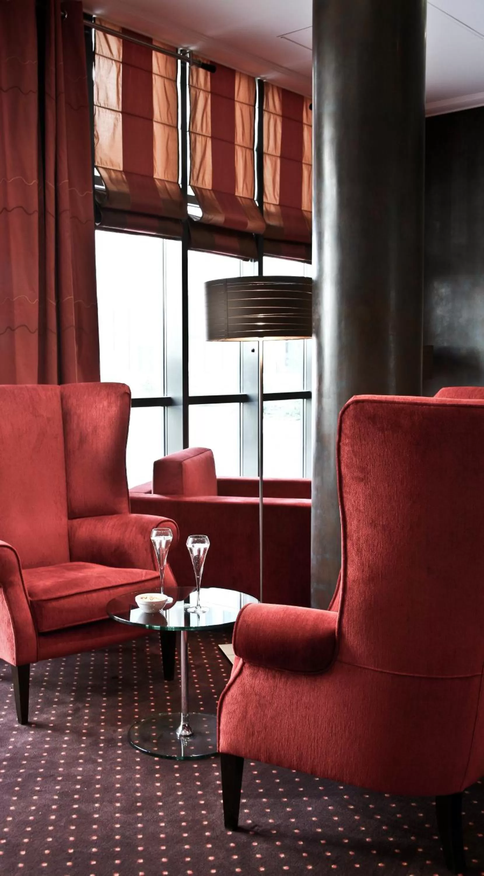 Communal lounge/ TV room in Hotel de Berny