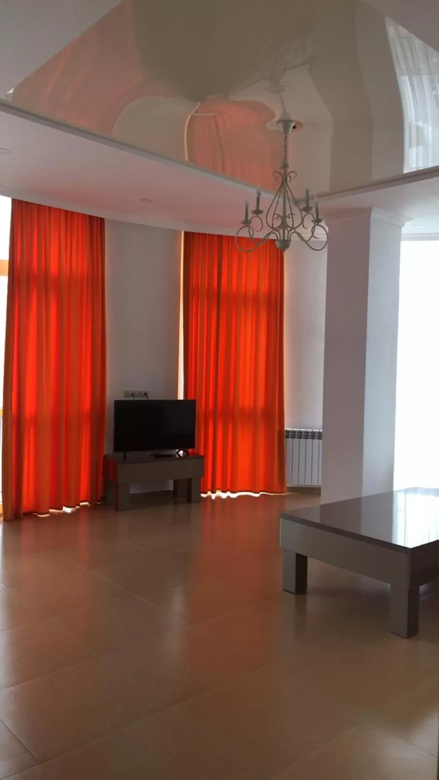 TV/Entertainment Center in Orange Home Hotel