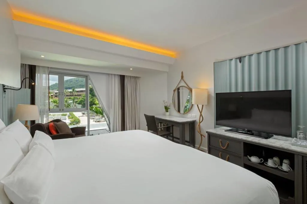 Bed in The Boathouse Phuket-SHA Plus