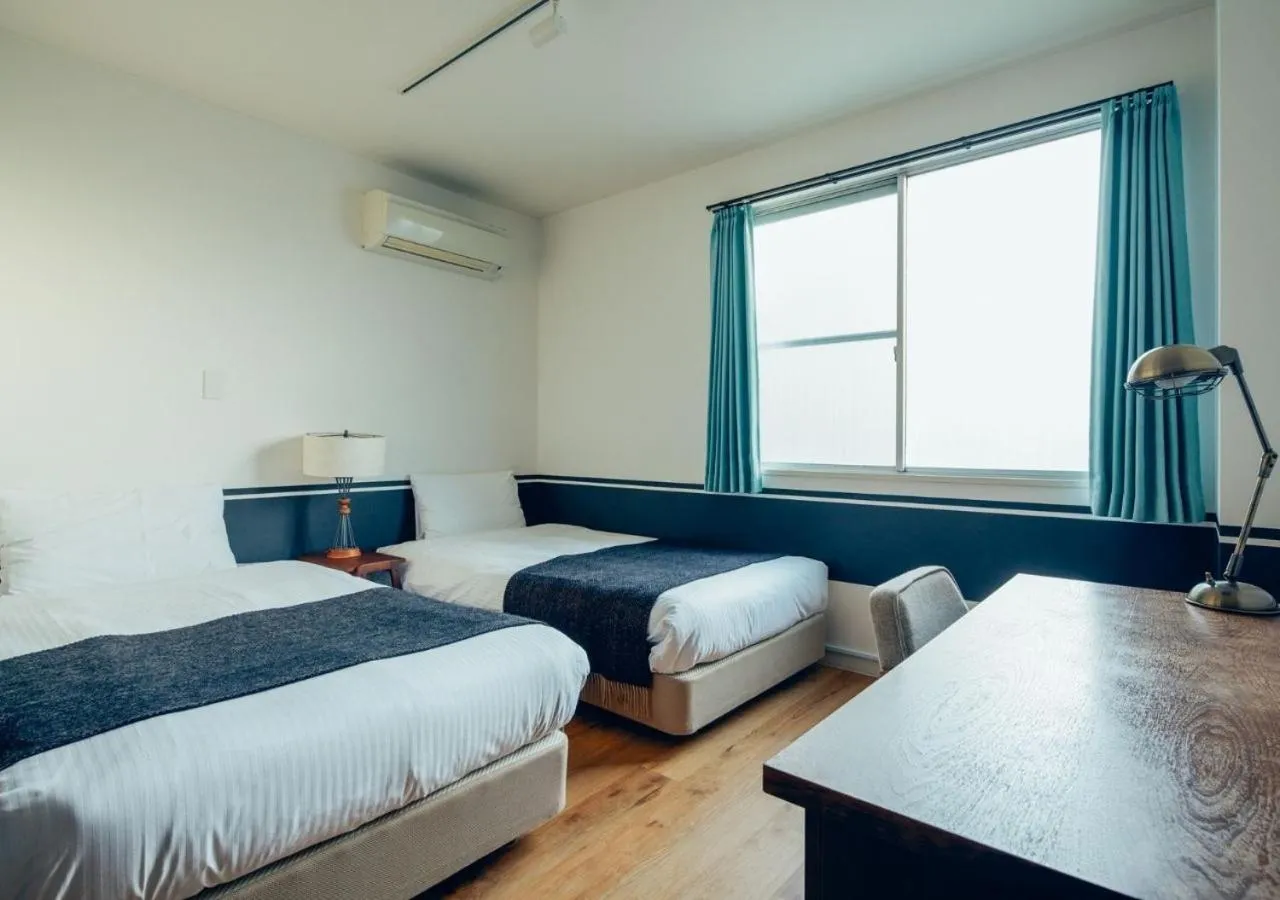 Bed in Hotel Graphy Nezu