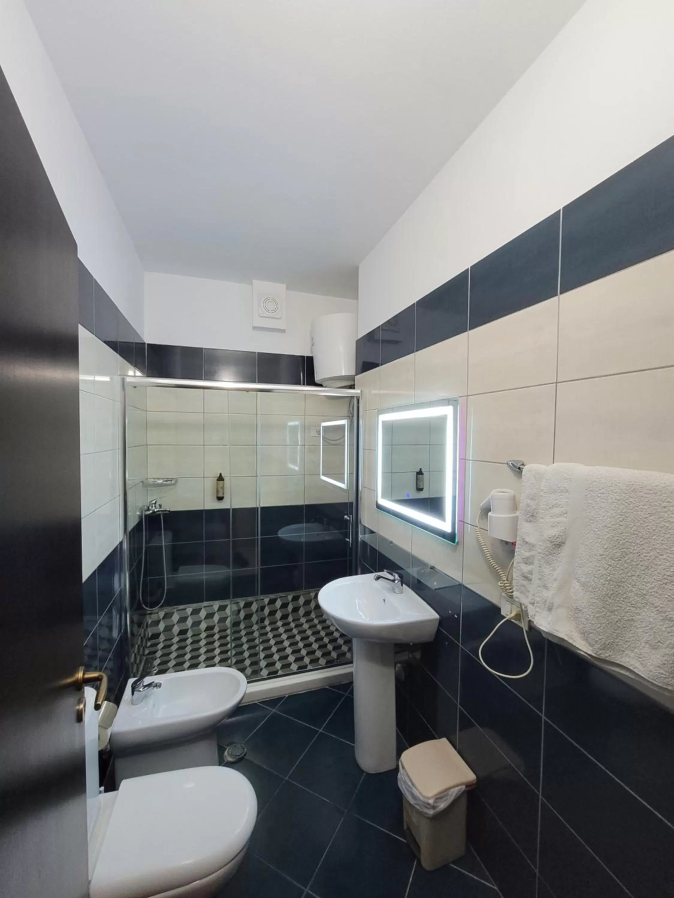 Bathroom in Haris Hotel