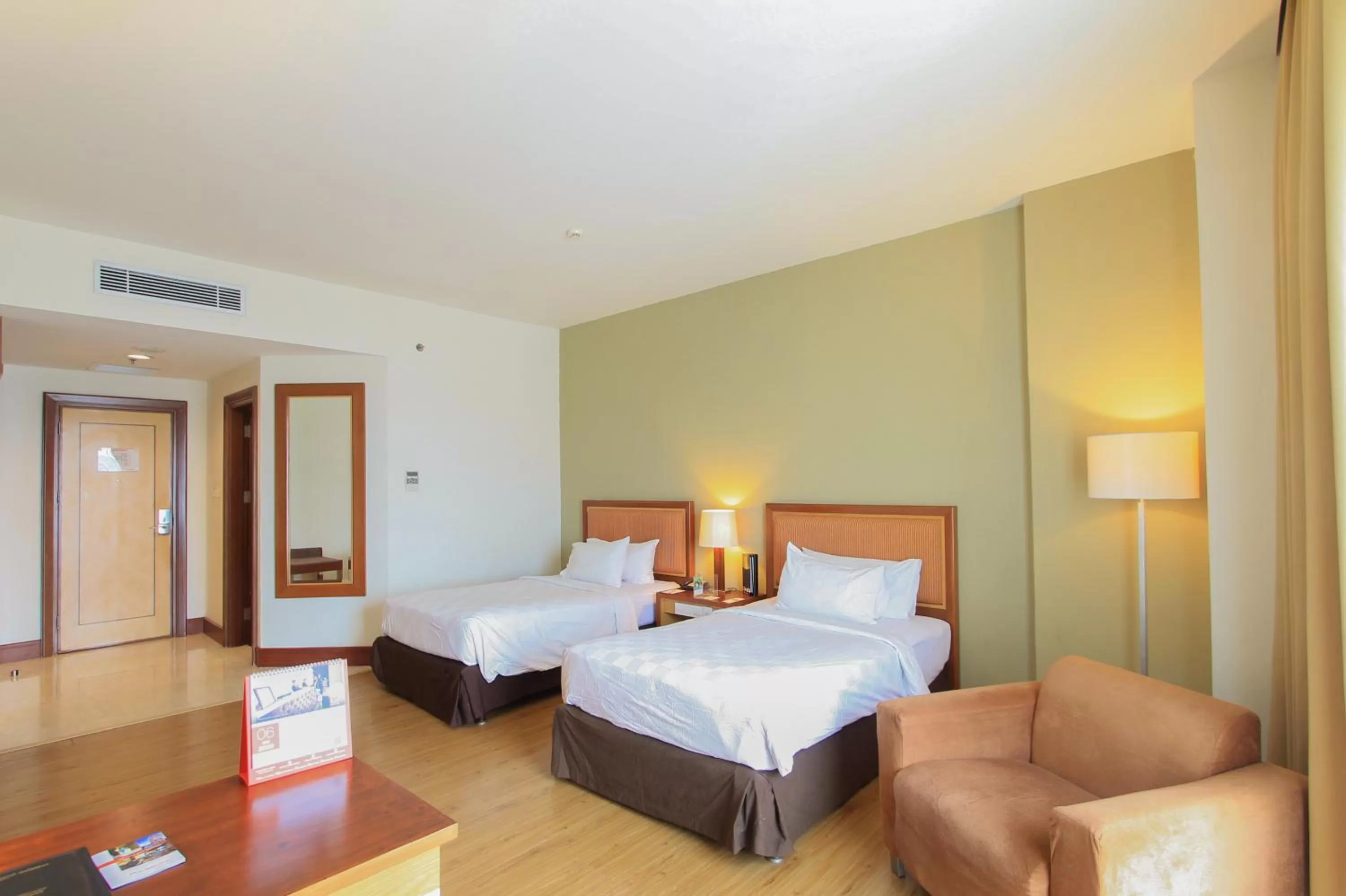 Photo of the whole room, Bed in Swiss-Belhotel Maleosan Manado