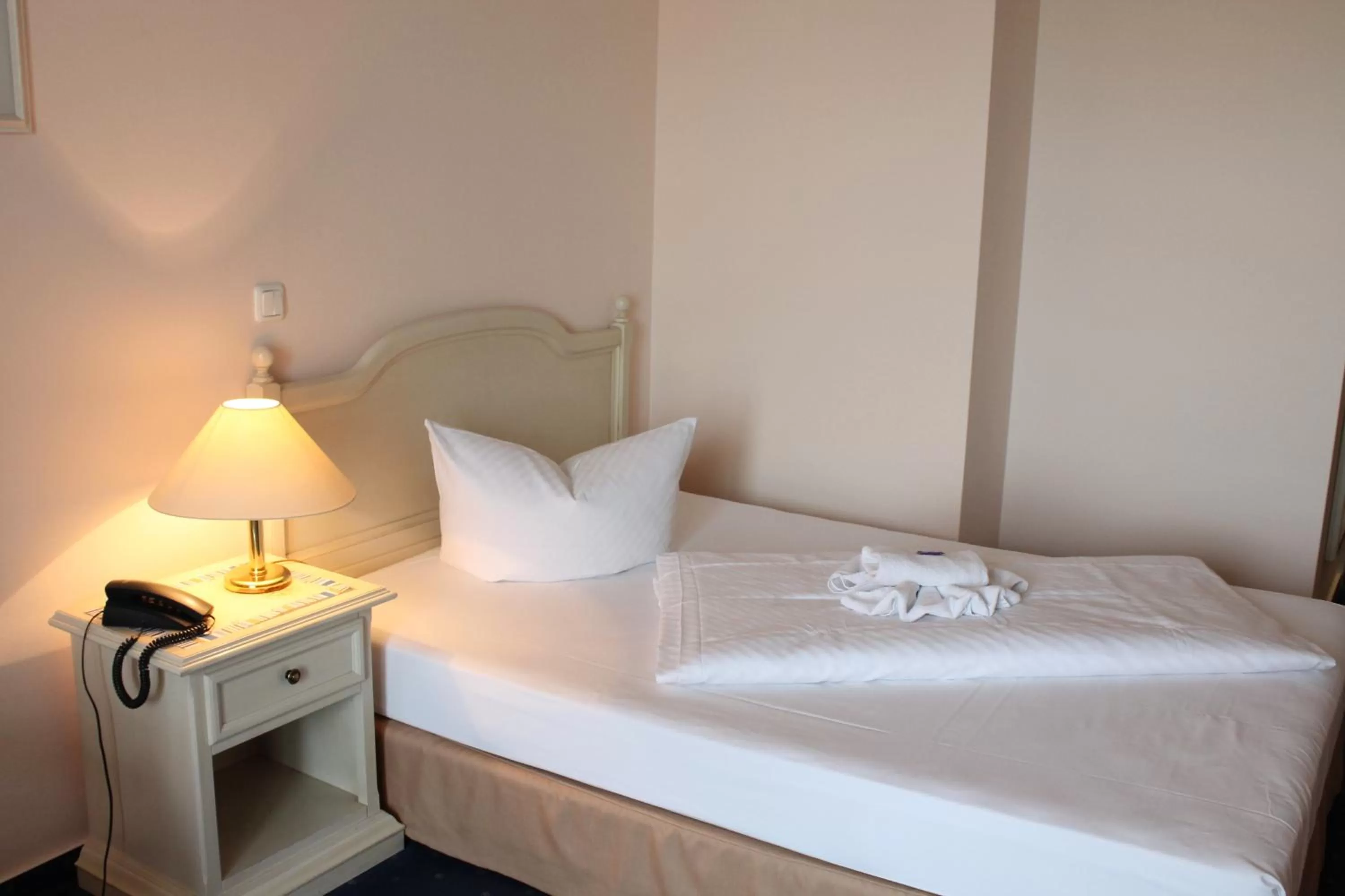 Bed in Hotel Bellevue Warnemünde