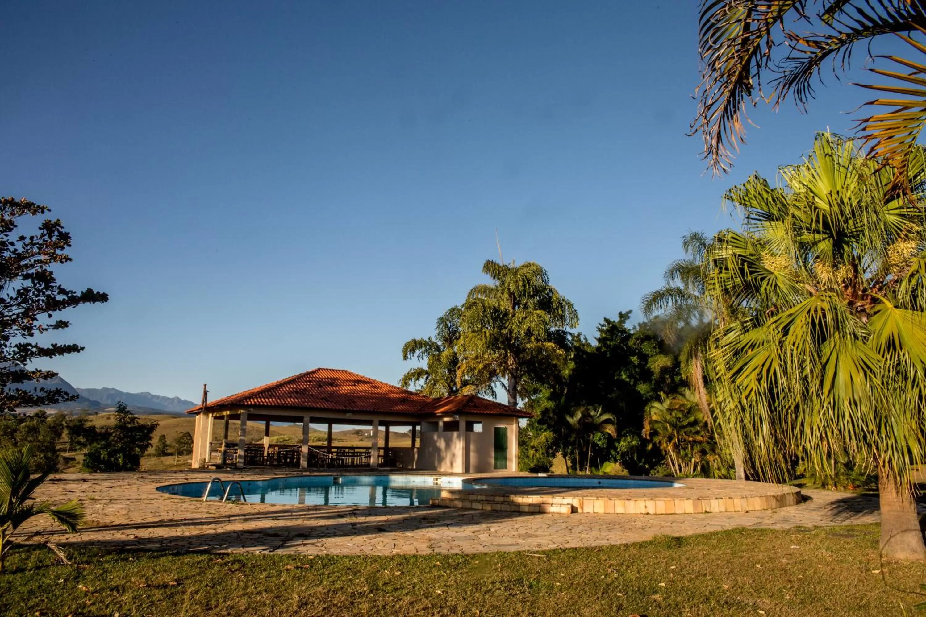 Pool view, Property Building in Pousada Flor da Serra
