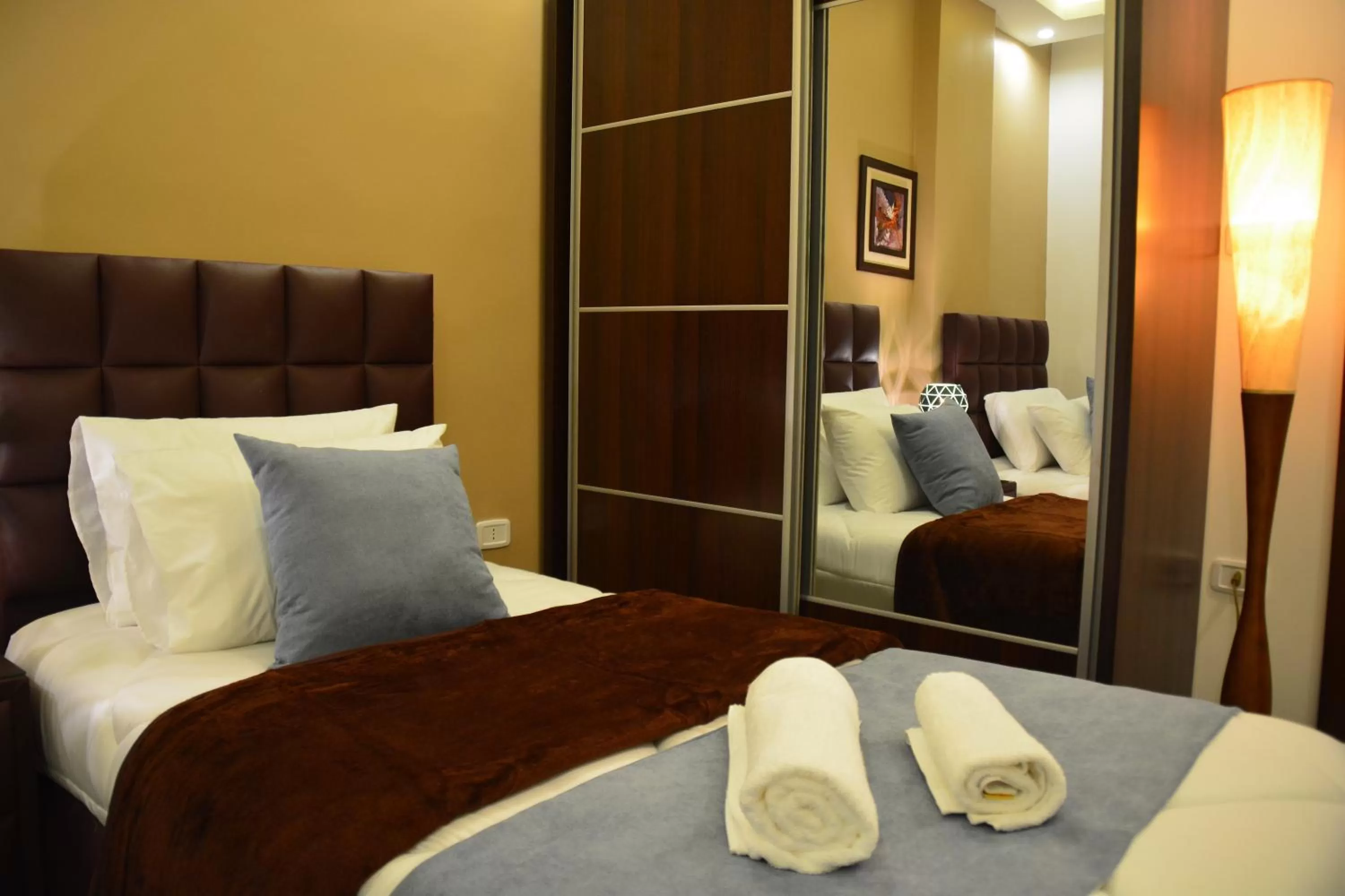 Bed in سما عمان للشقق الفندقية Sama Amman Hotel Apartments