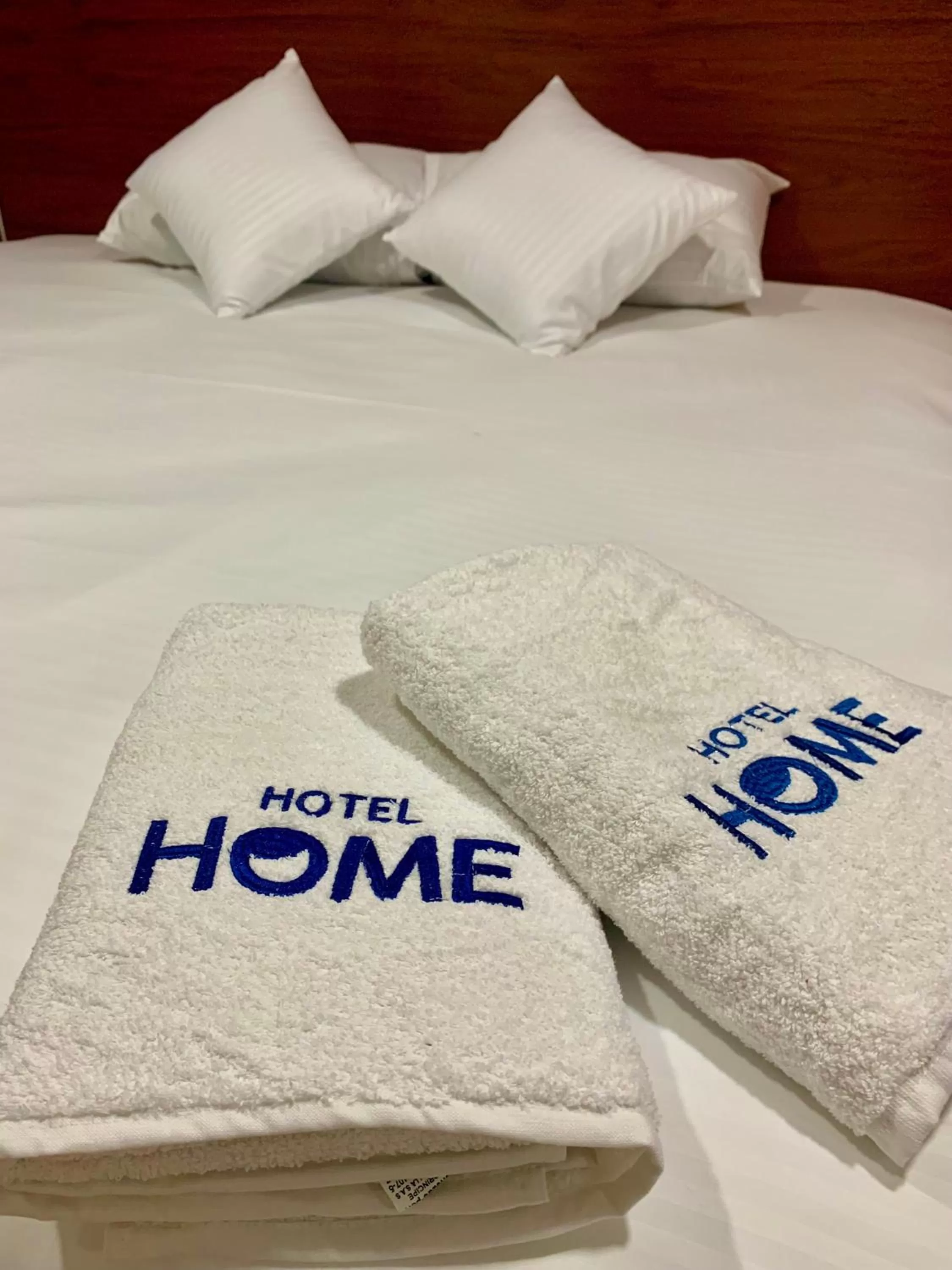 towels, Bed in HOTEL HOME