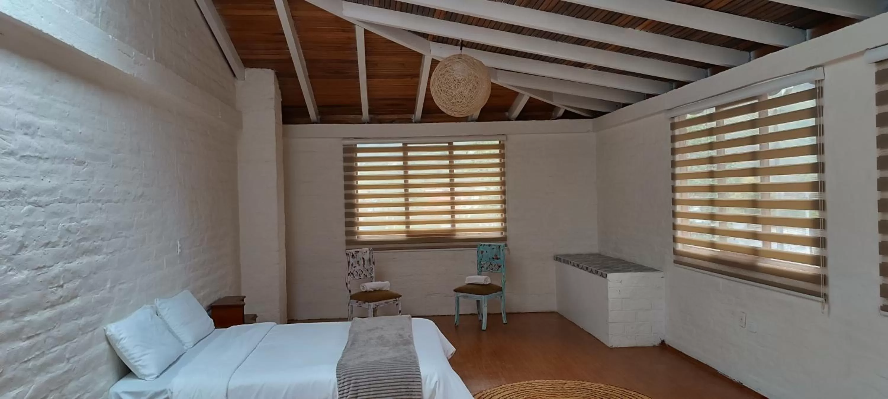 Bed in Rústic Hotel Quinta La Aurora