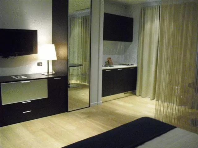 Photo of the whole room, Bed in Joia Hotel & Luxury Apartments RTA