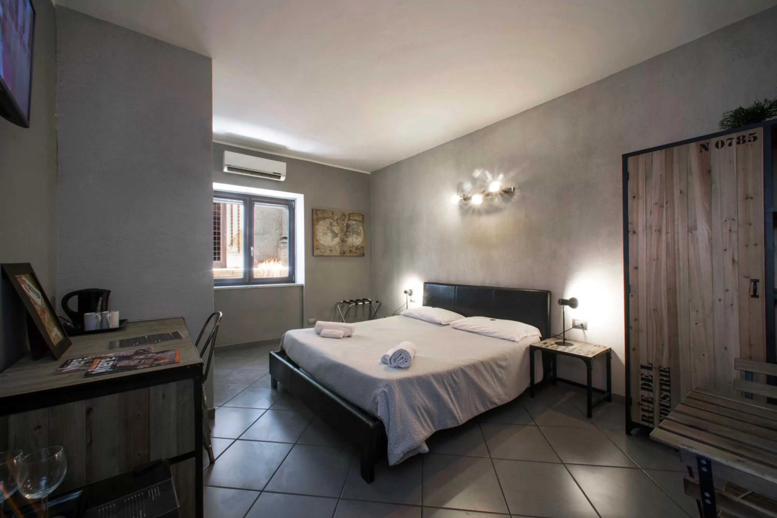 Photo of the whole room, Bed in Il Taschino Suite