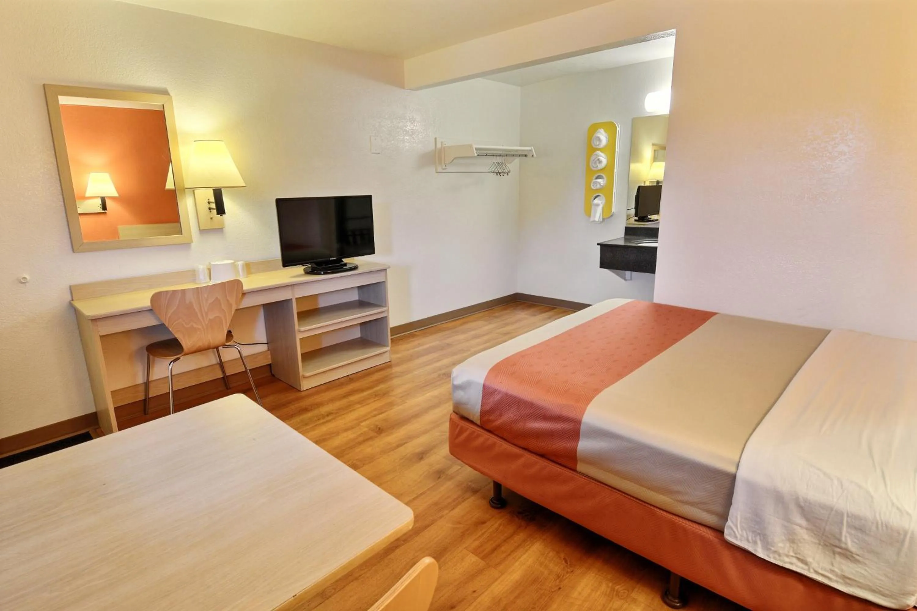 Seating area, Bed in Travelodge by Wyndham Brattleboro VT