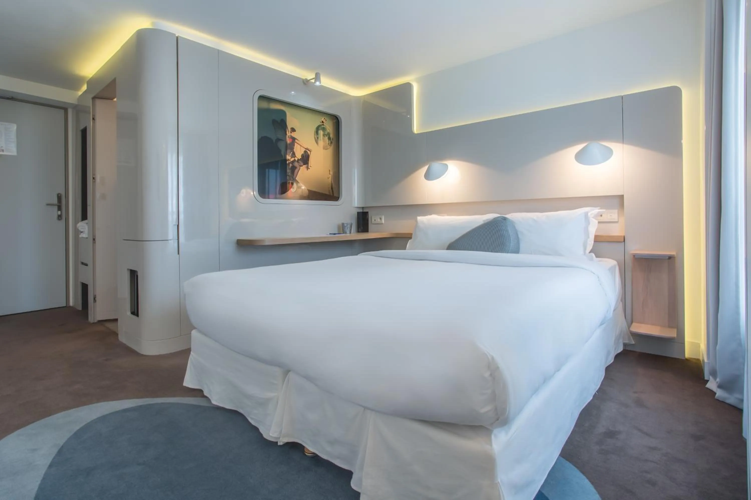 Bed in Hôtel Le Marcel Paris Gare de l'Est