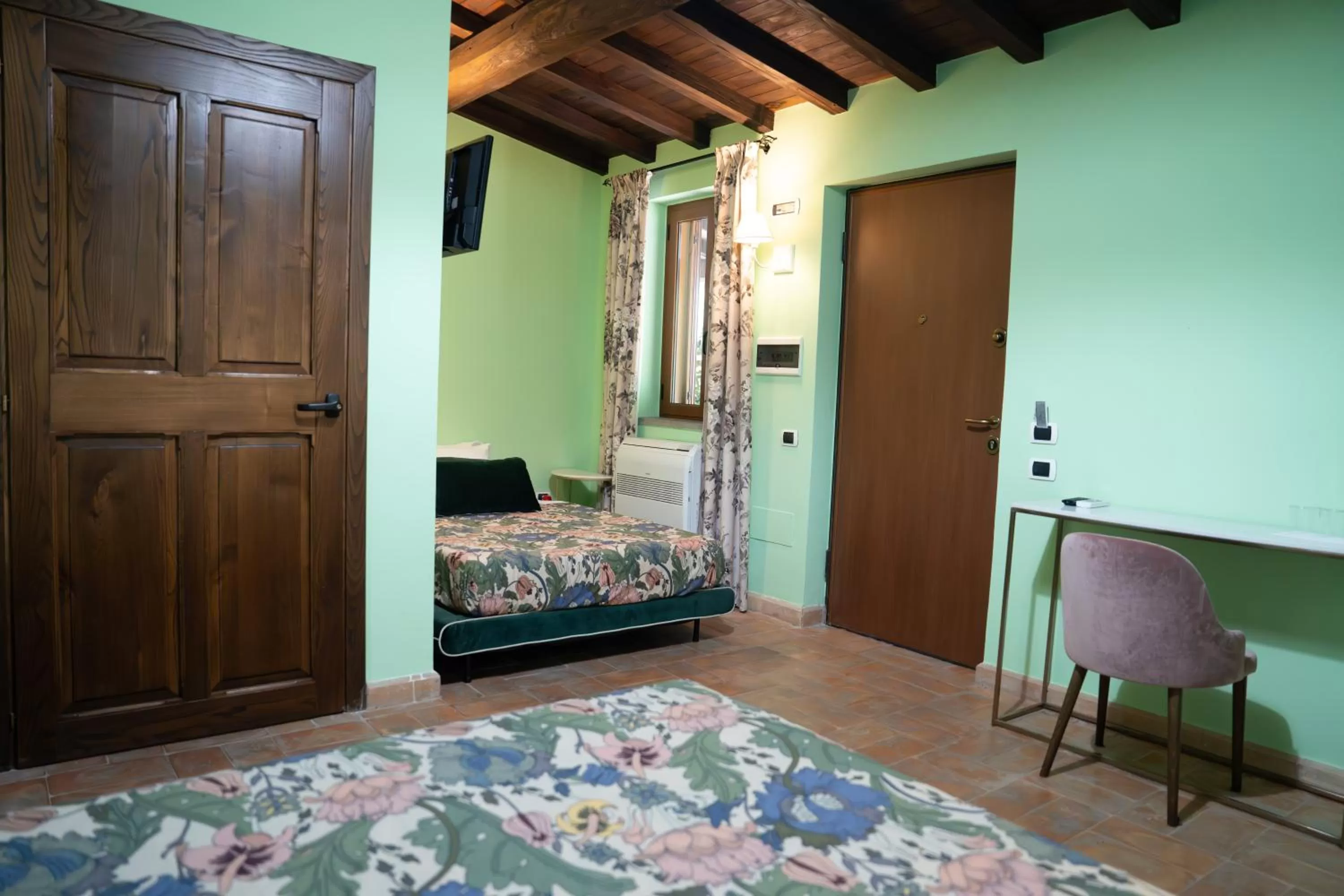 Bed in Relais Santa Caterina Hotel