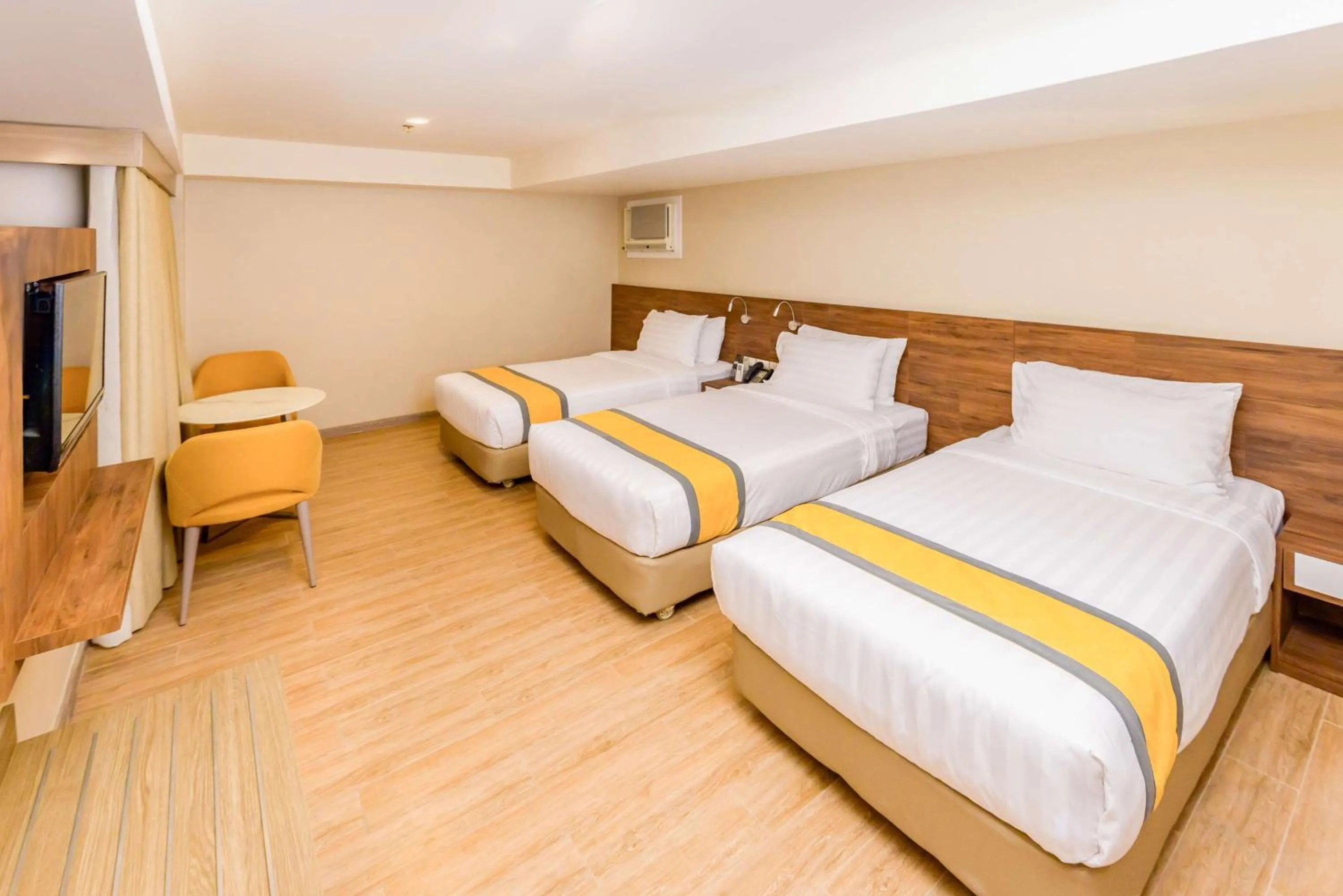 Bedroom, Bed in SureStay Plus by Best Western Cebu City