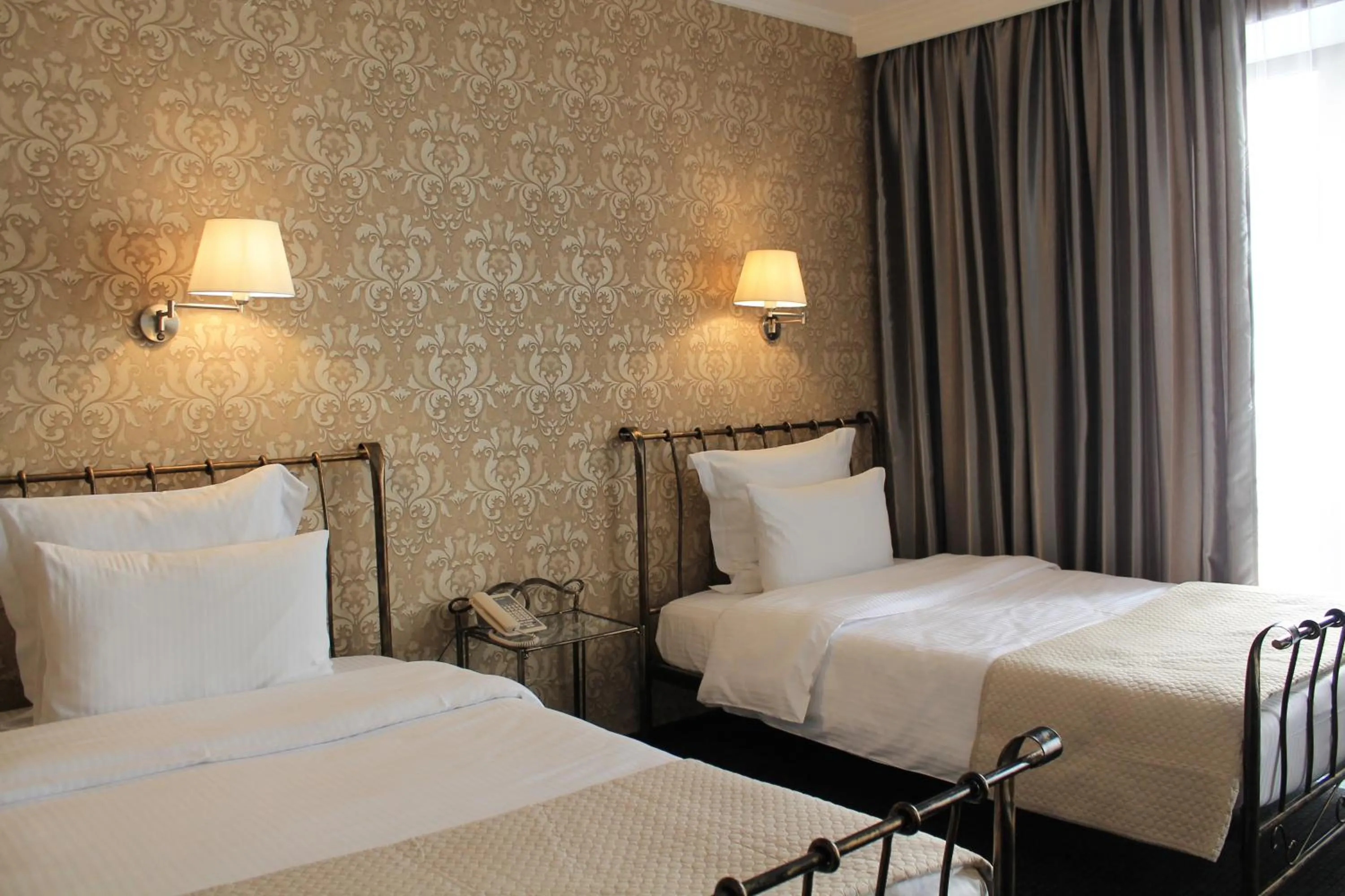 Bed in Redline Hotel