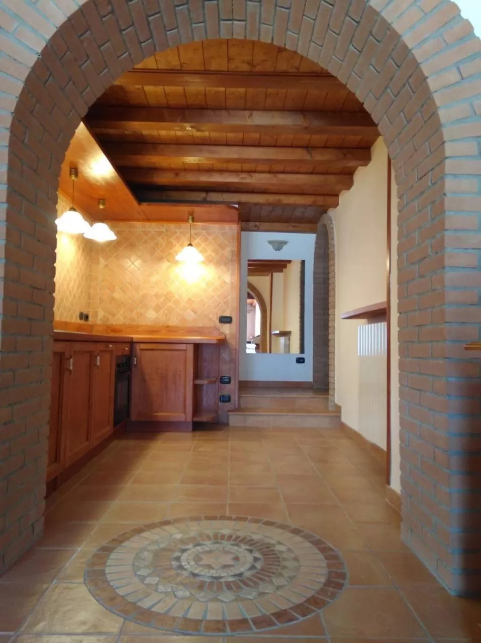 Communal kitchen in Resort Ninfea San Pellegrino Terme