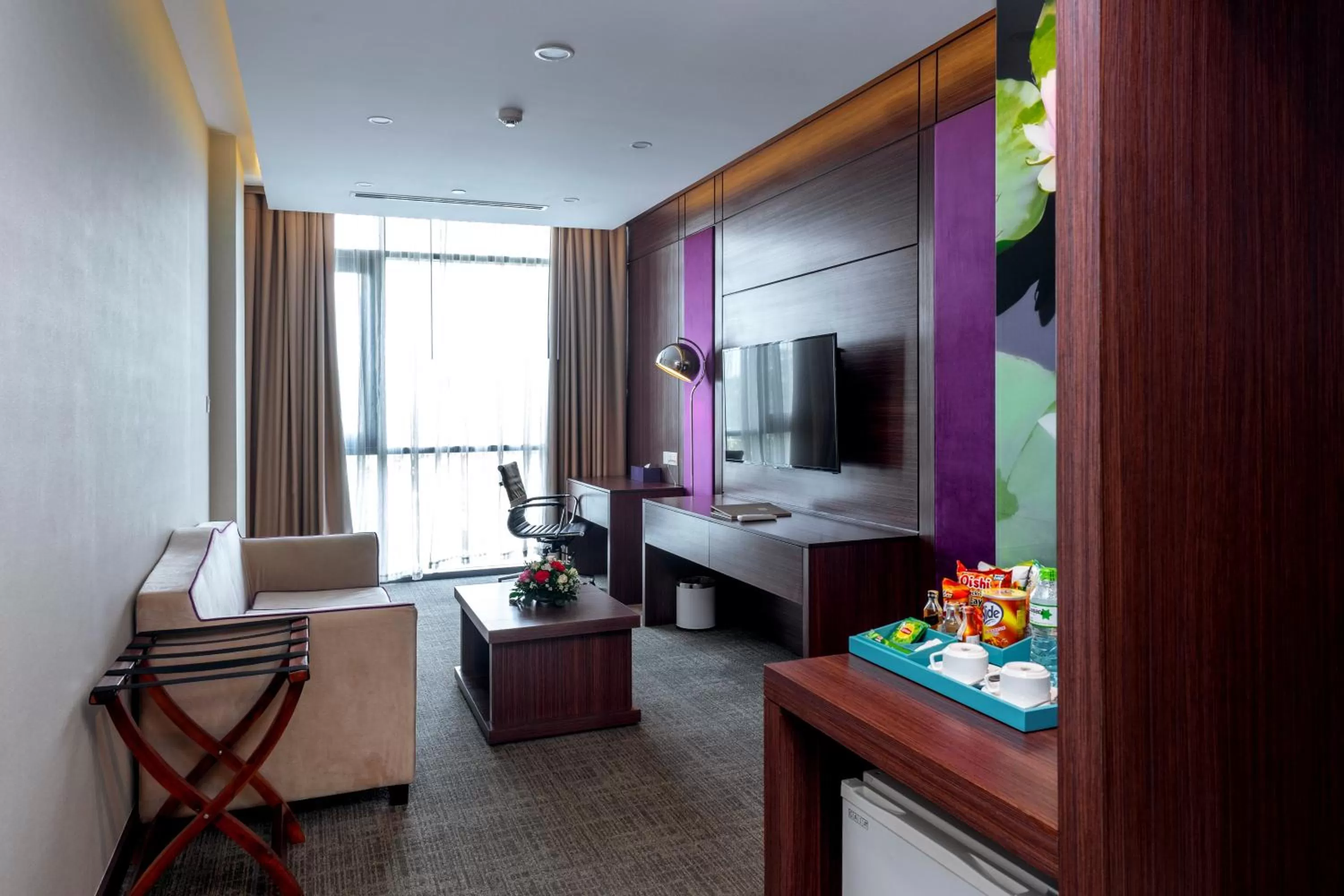 TV and multimedia, Bed in Becamex Hotel New City