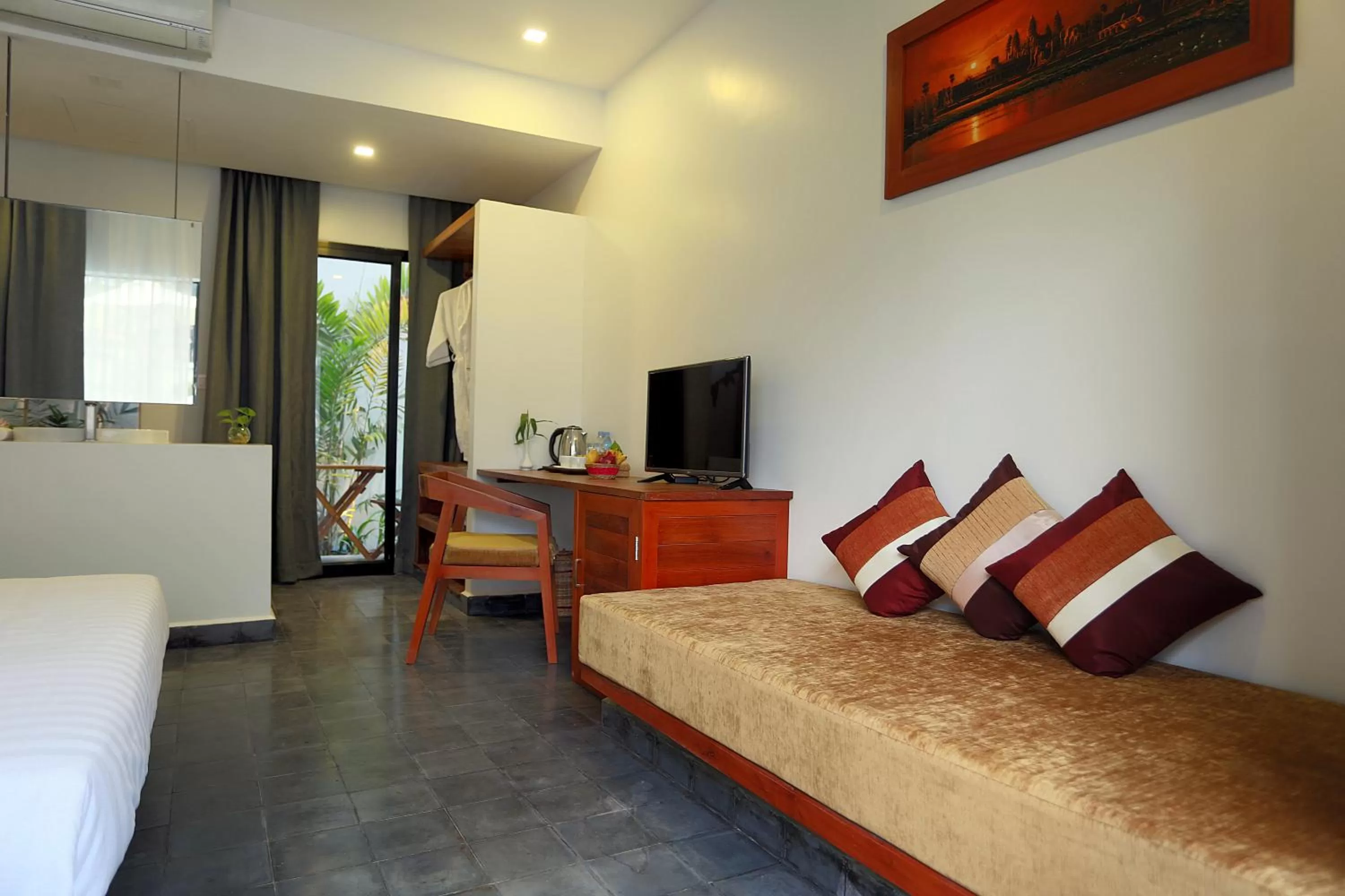 Seating area, Bed in Sam So Boutique Villa