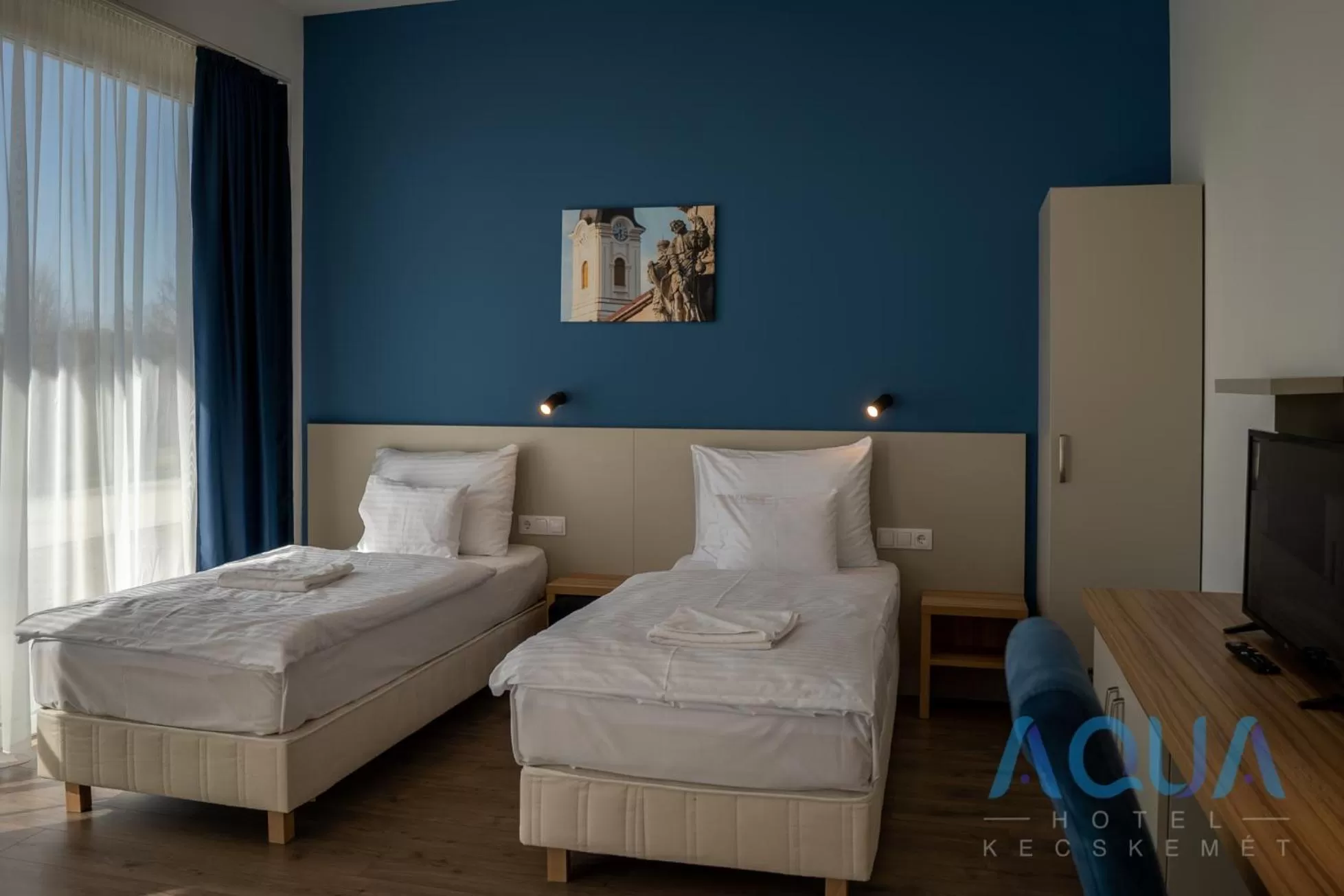 Photo of the whole room, Bed in Aqua Hotel