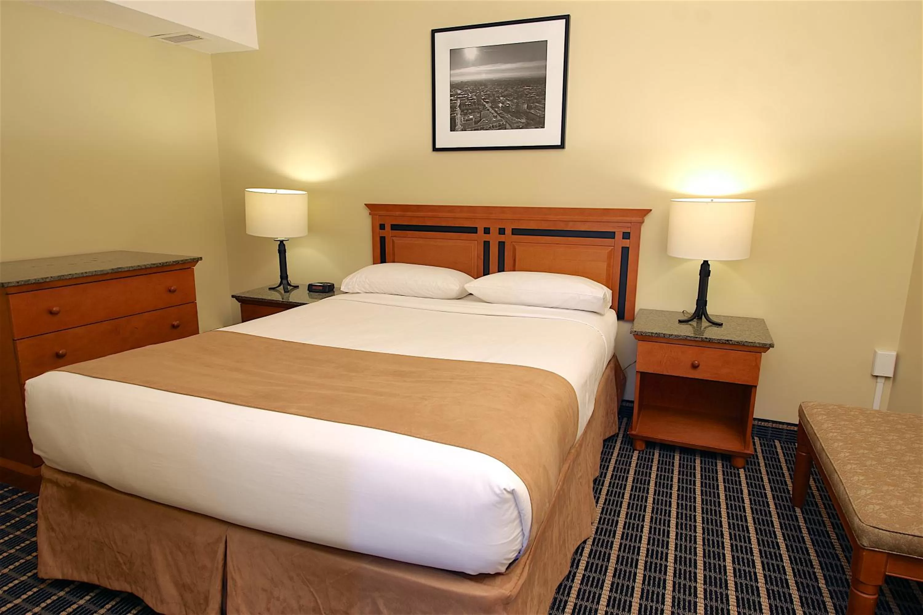 Bed in Medicine Hat Suites