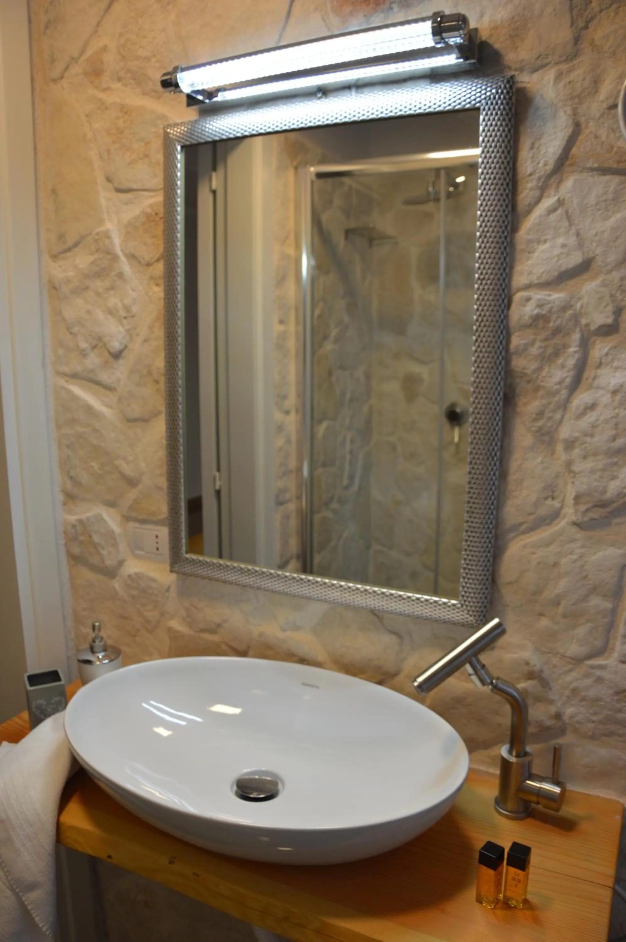 Bathroom in Hotel Residence La Corvetta