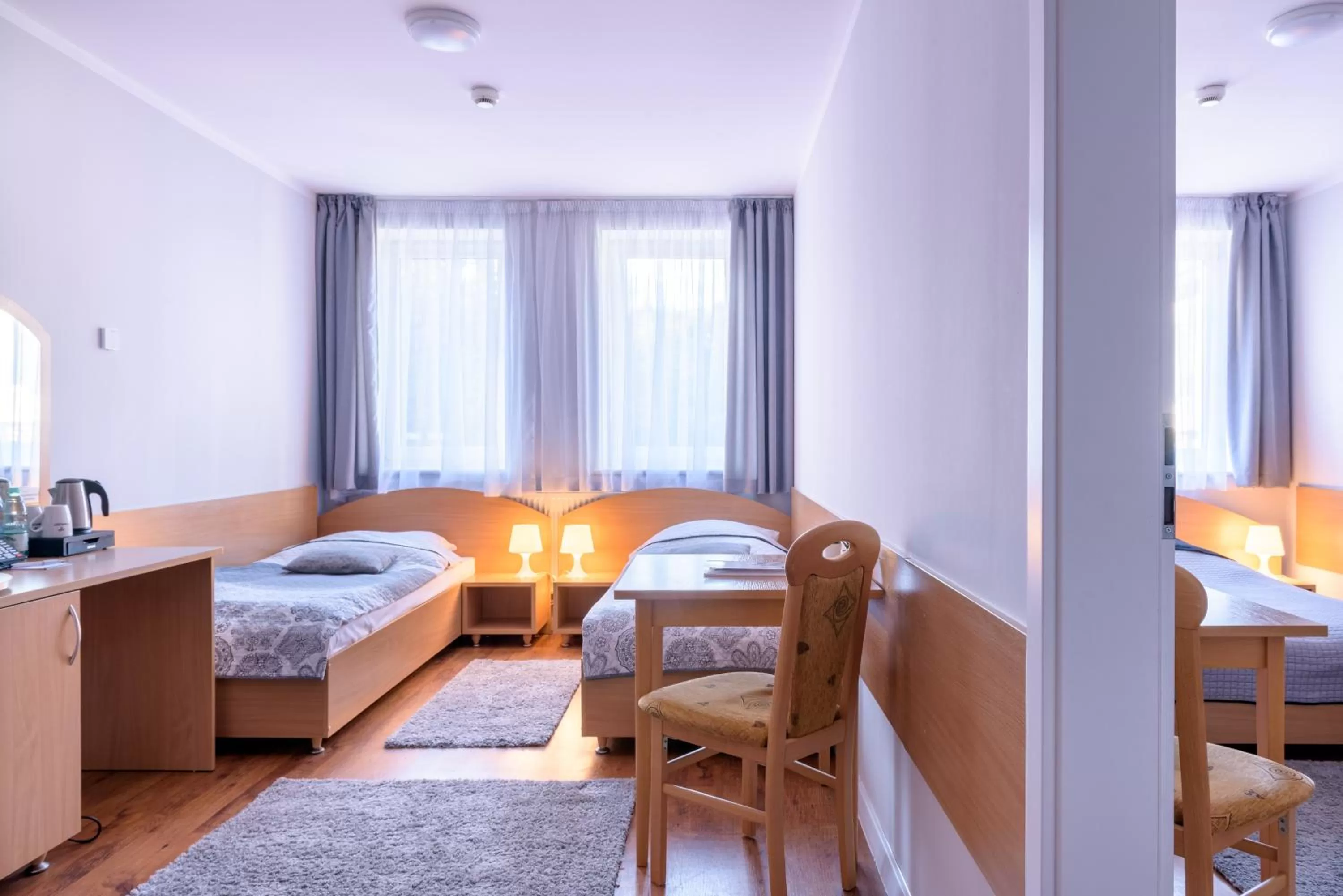 Bed in Tailor Hotel Sport & Conference