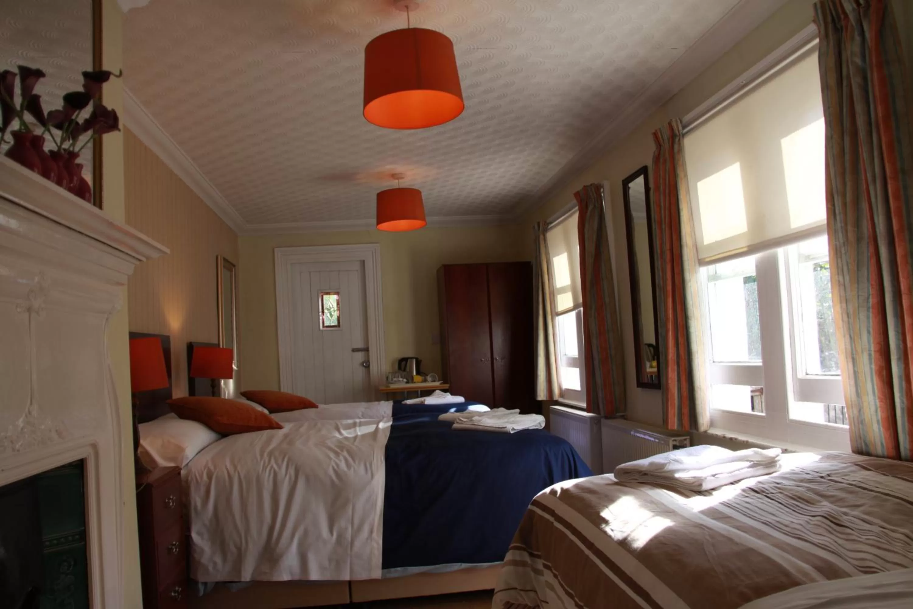 Bed in Ambassador Hotel