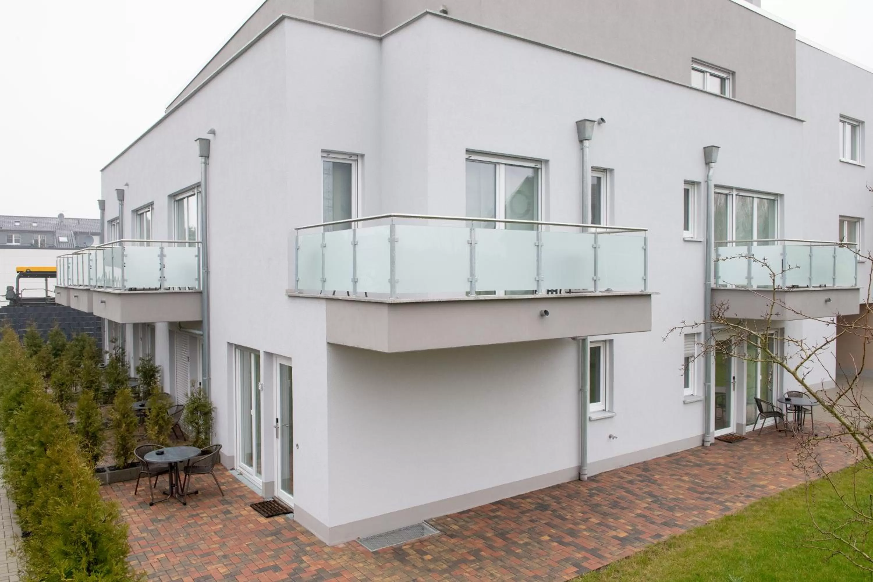 Garden, Property Building in GLEUEL INN - digital hotel & serviced apartments & boardinghouse mit voll ausgestatteten Küchen