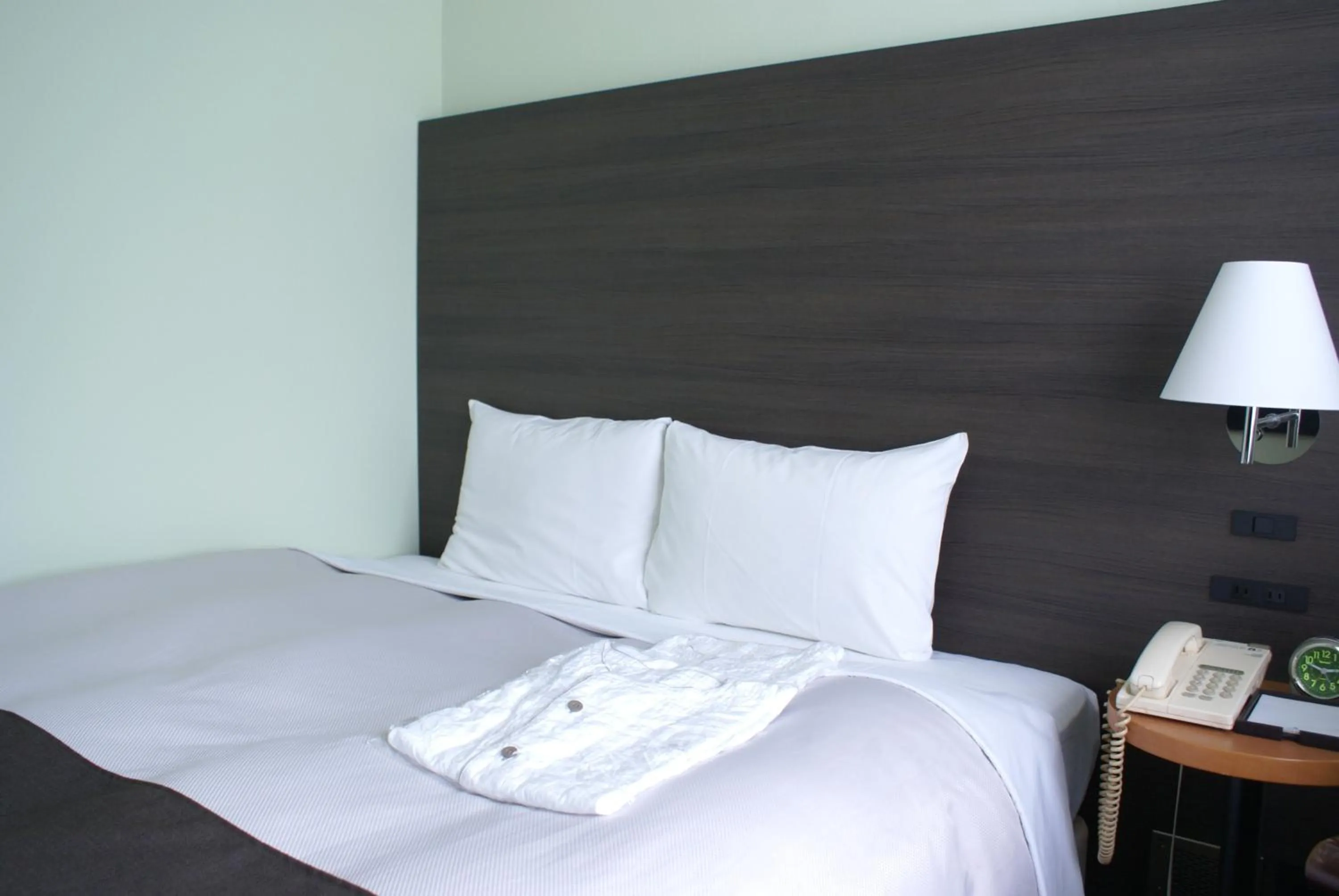 Bed in Ginza Grand Hotel