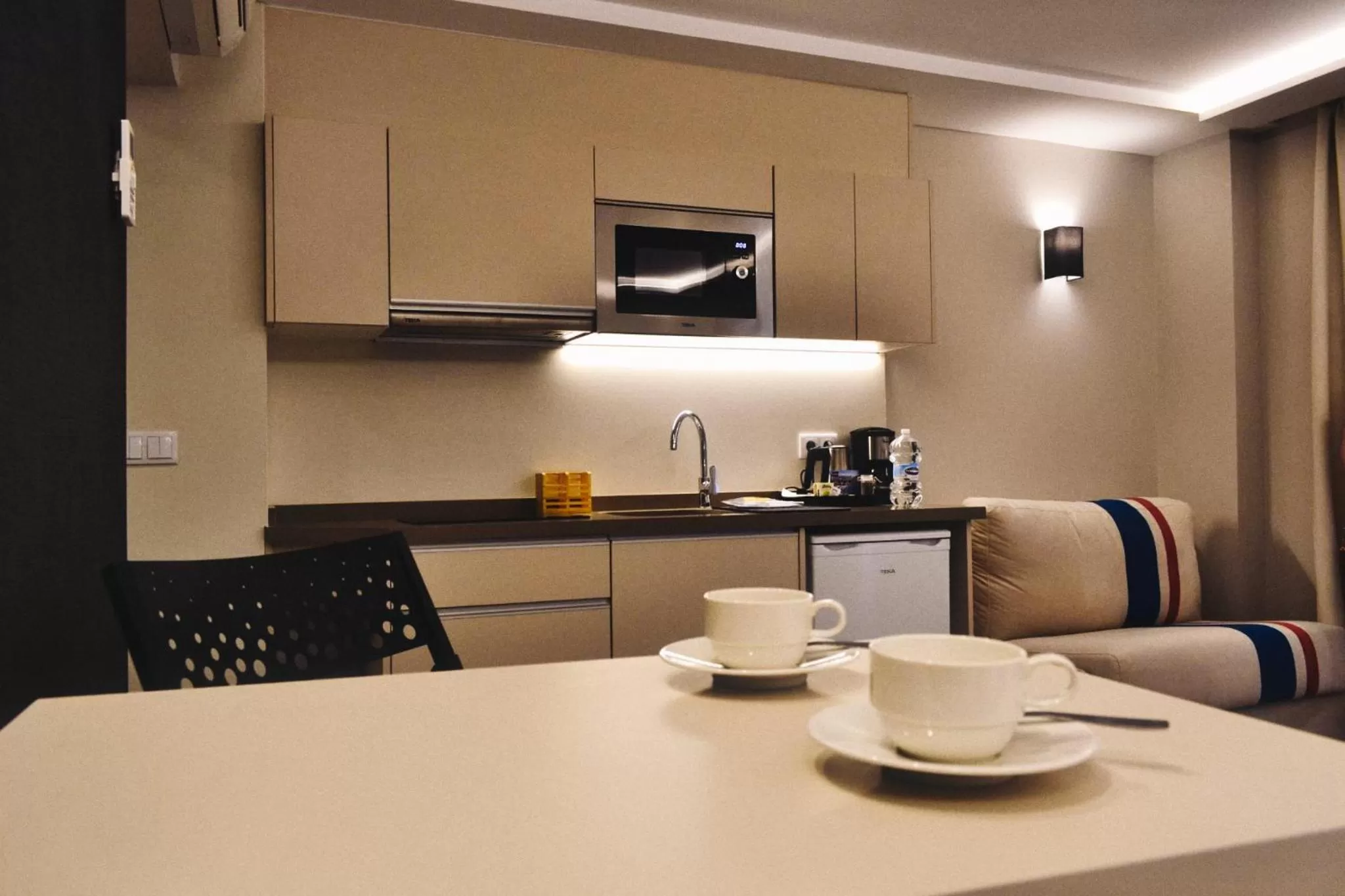 Kitchen or kitchenette in Posidonia Aparthotel