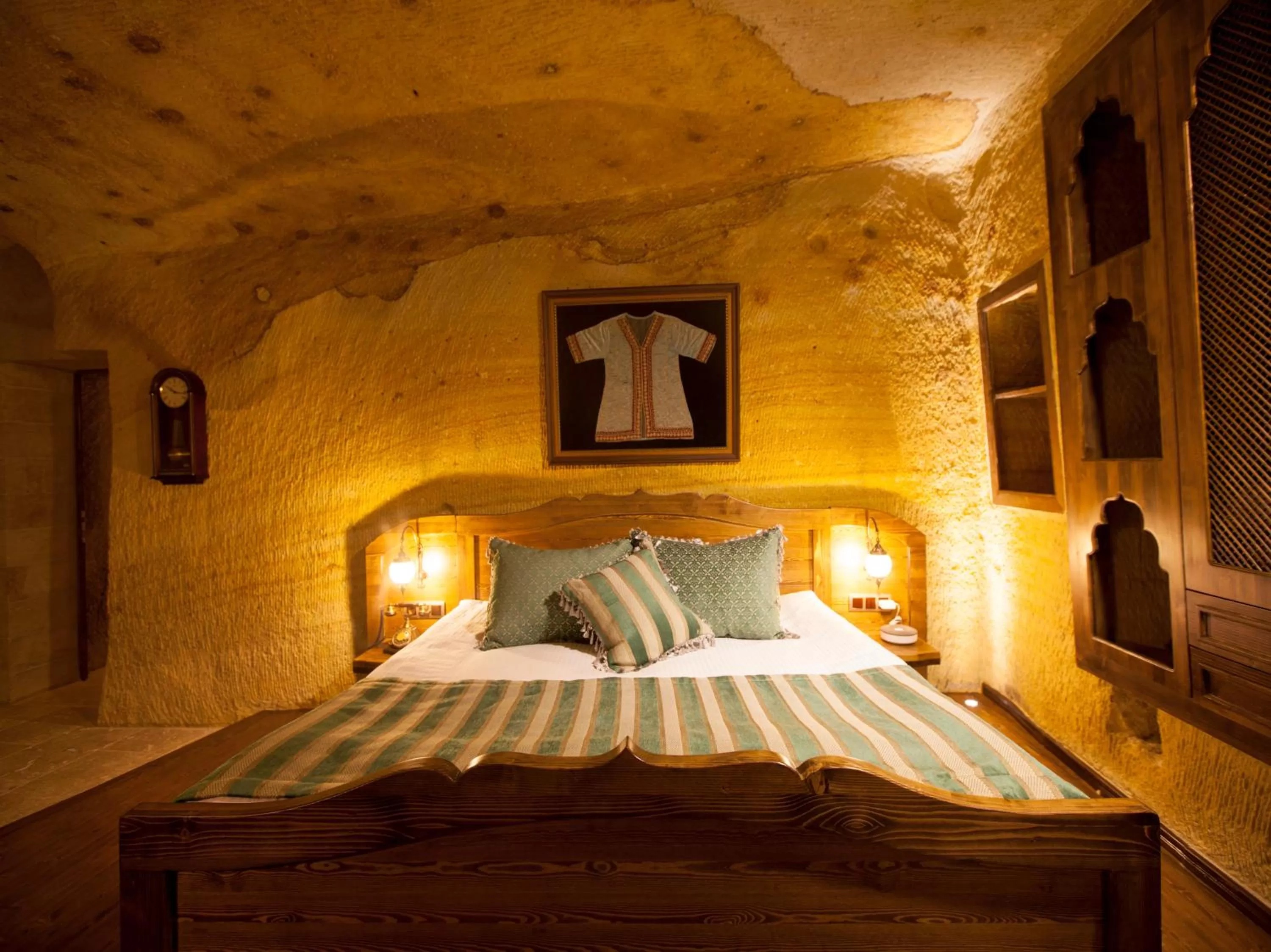 Bed in Kayakapi Premium Caves Cappadocia