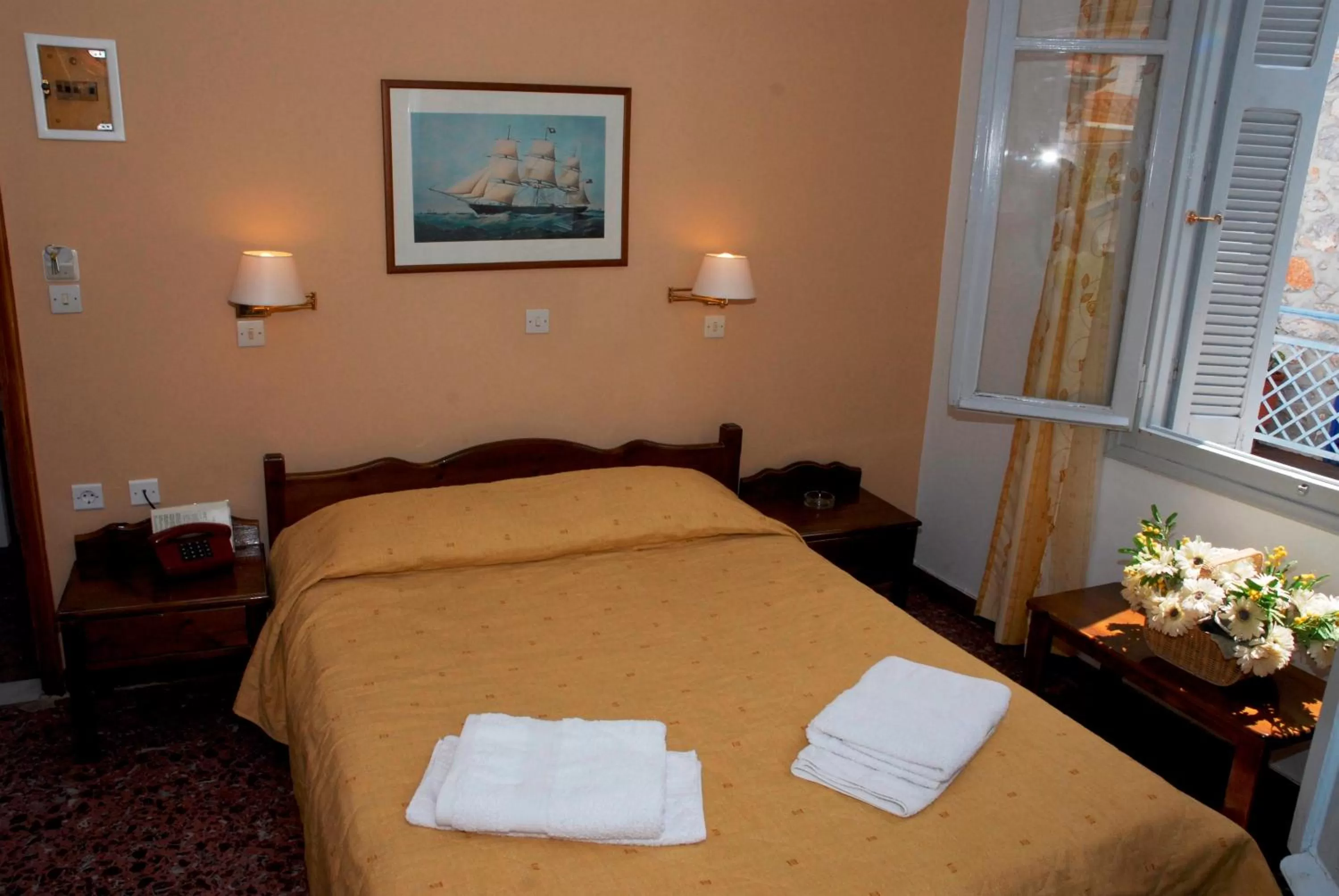 Bed in Amaryllis Hotel