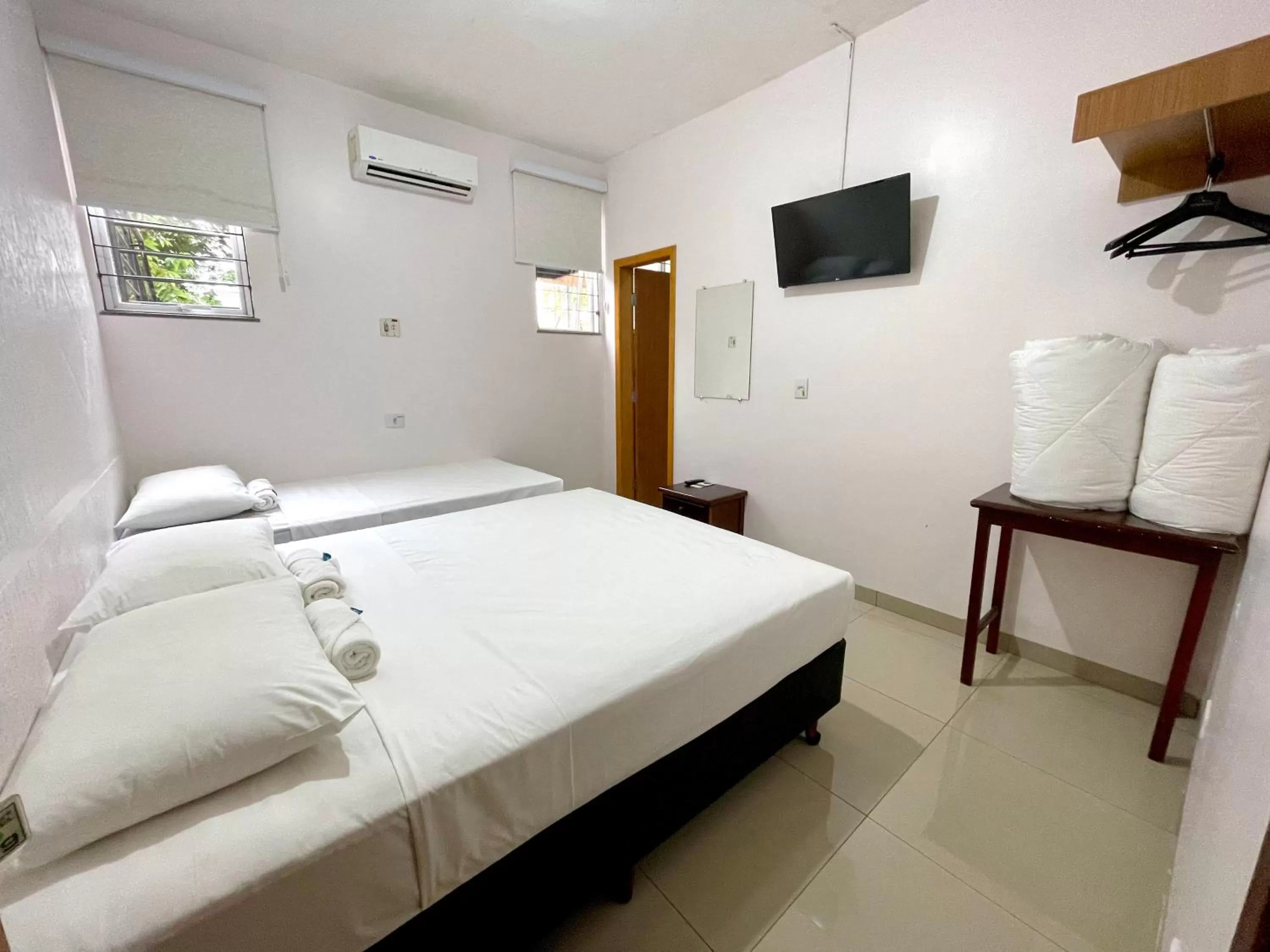 Bed in Nav Park Hotel