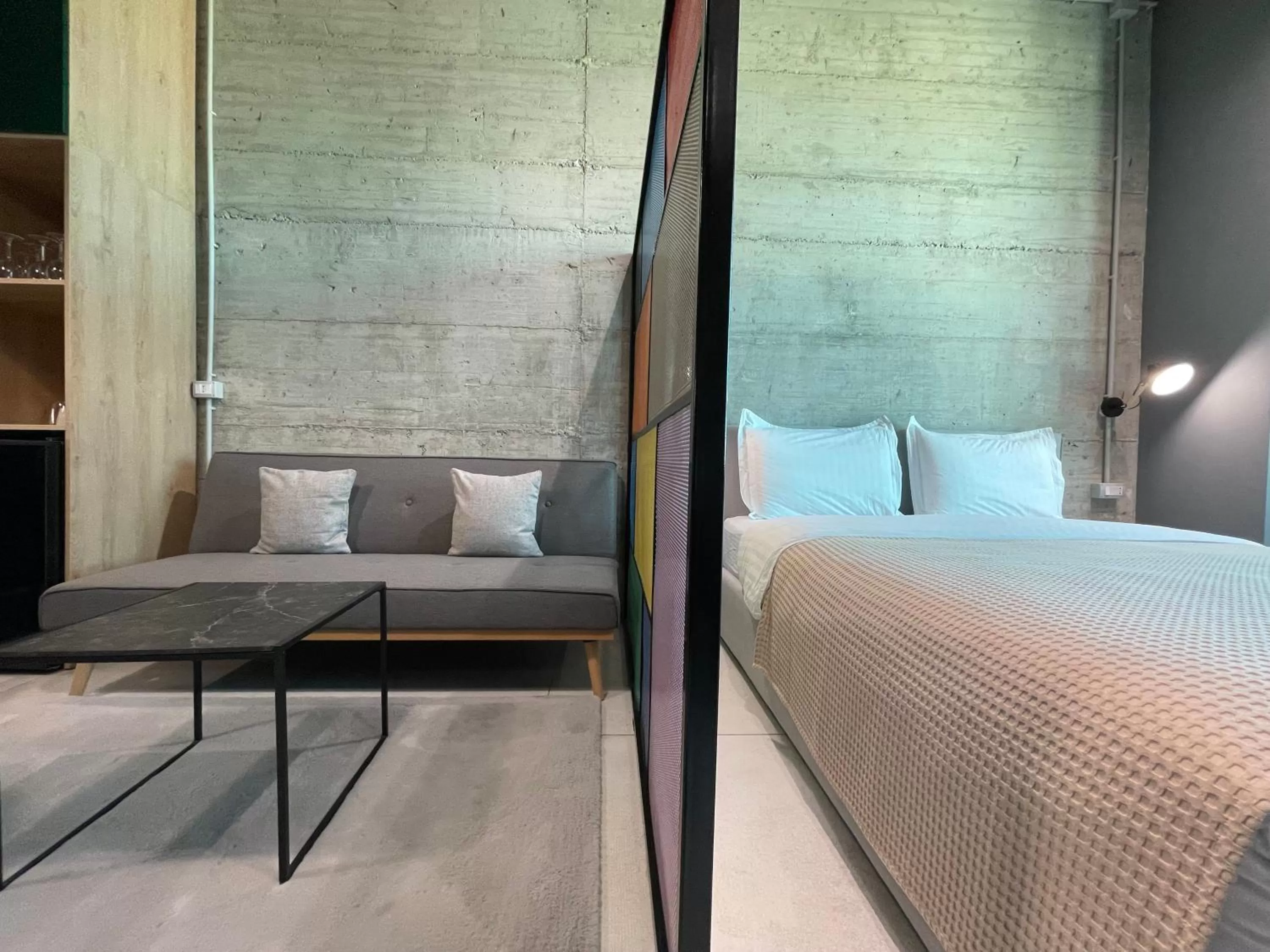 Bed in Ambassador Skyline Apartments