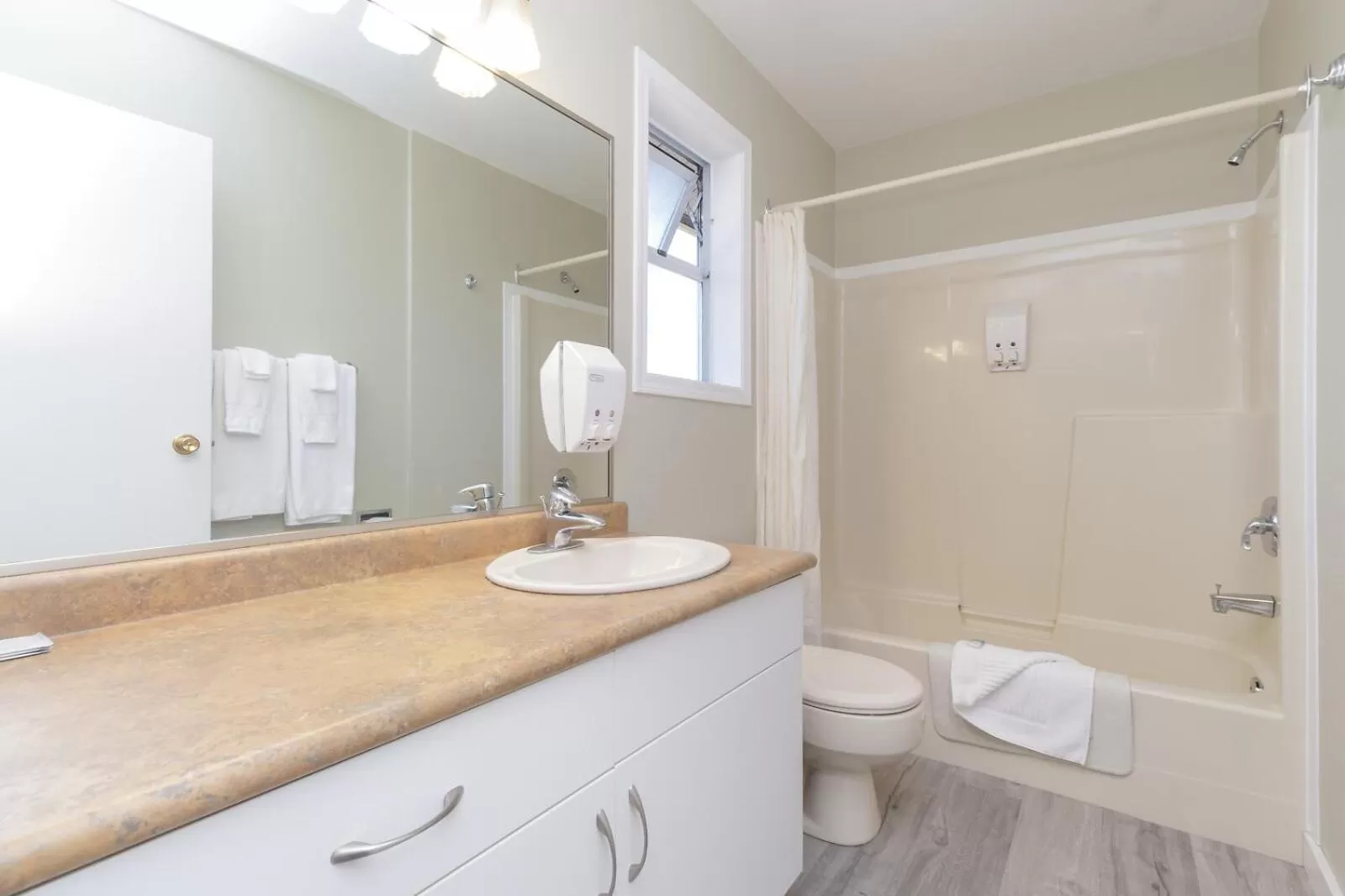 Bathroom in The Cedarwood Inn & Suites