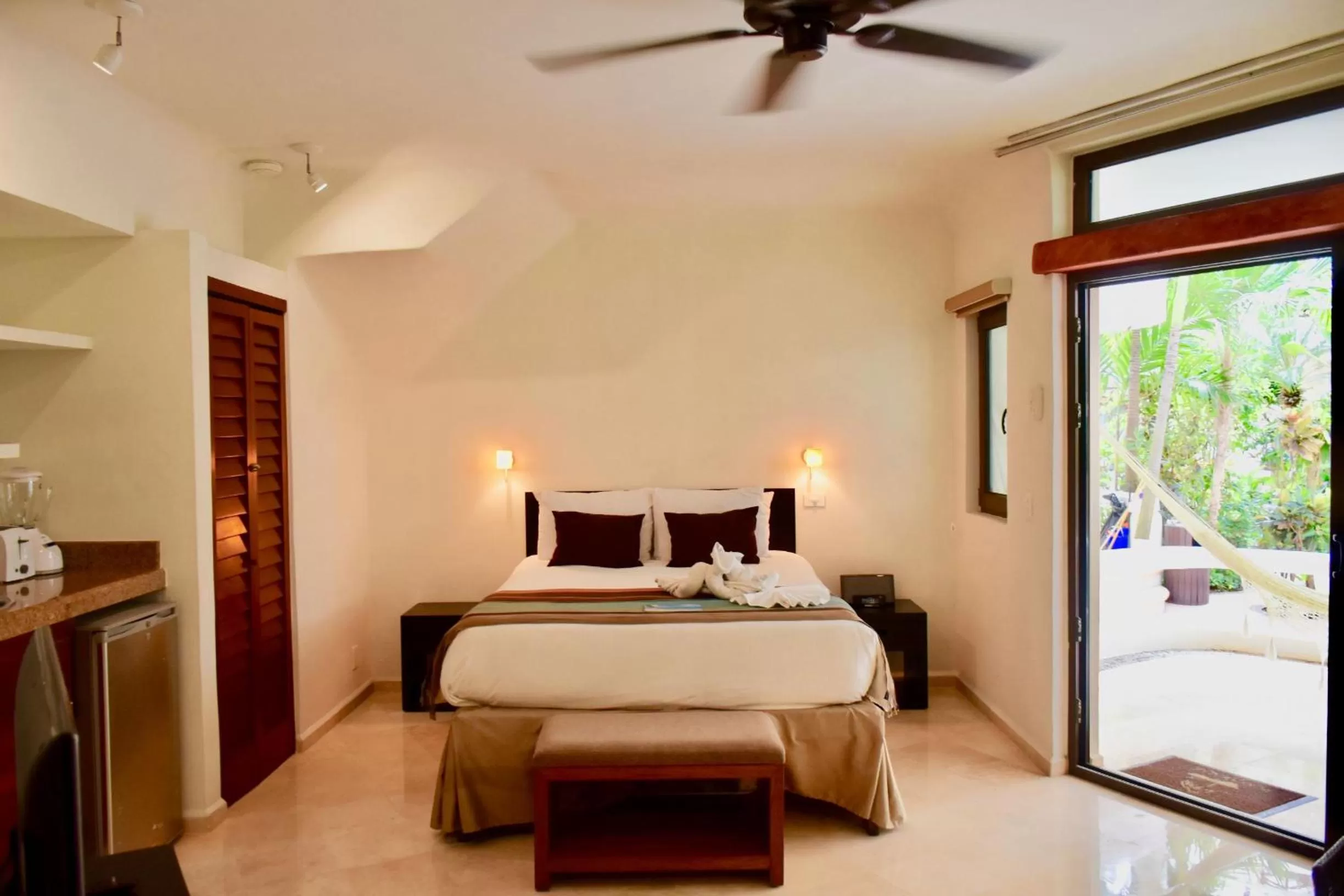 Bed in Playa Palms Beach Hotel