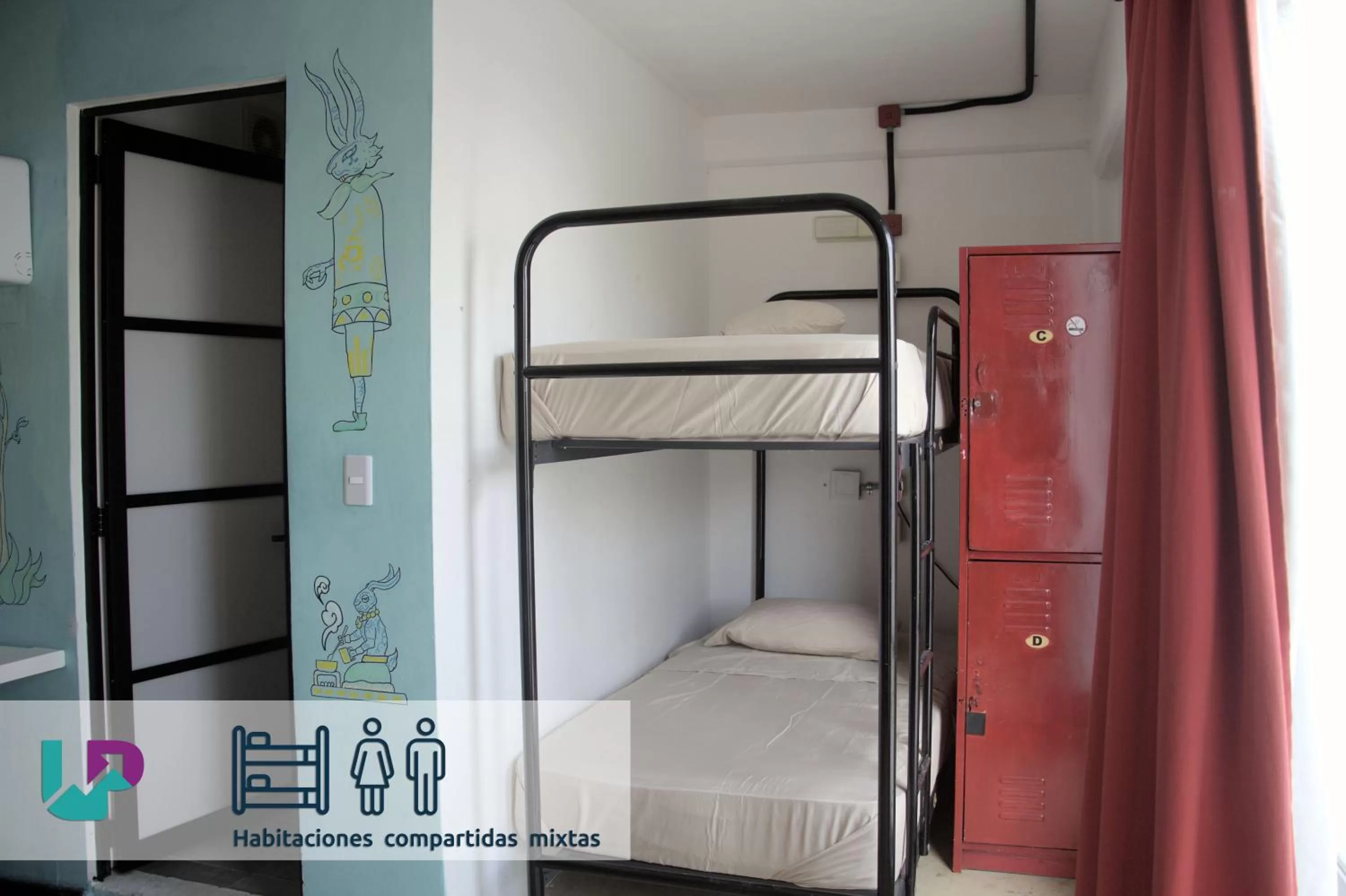 Photo of the whole room, Bunk Bed in Hotel & Hostal Casa de Luz Cancun