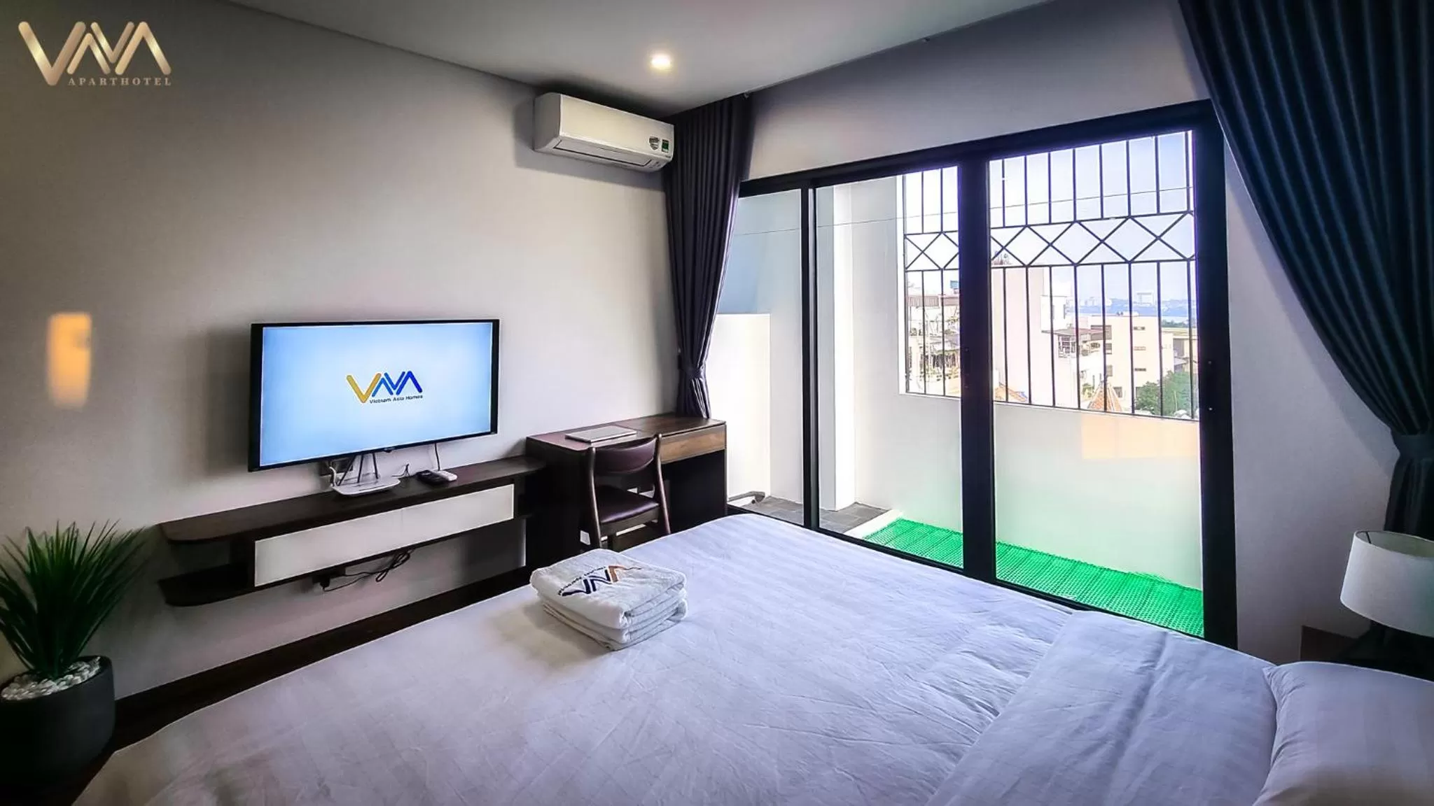 Bed in VNAHOMES APARTHOTEL