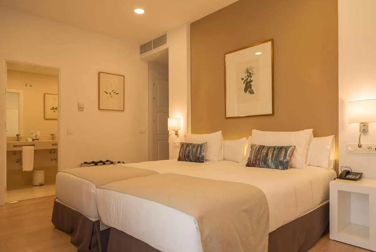 Bed in Hotel Alcázar