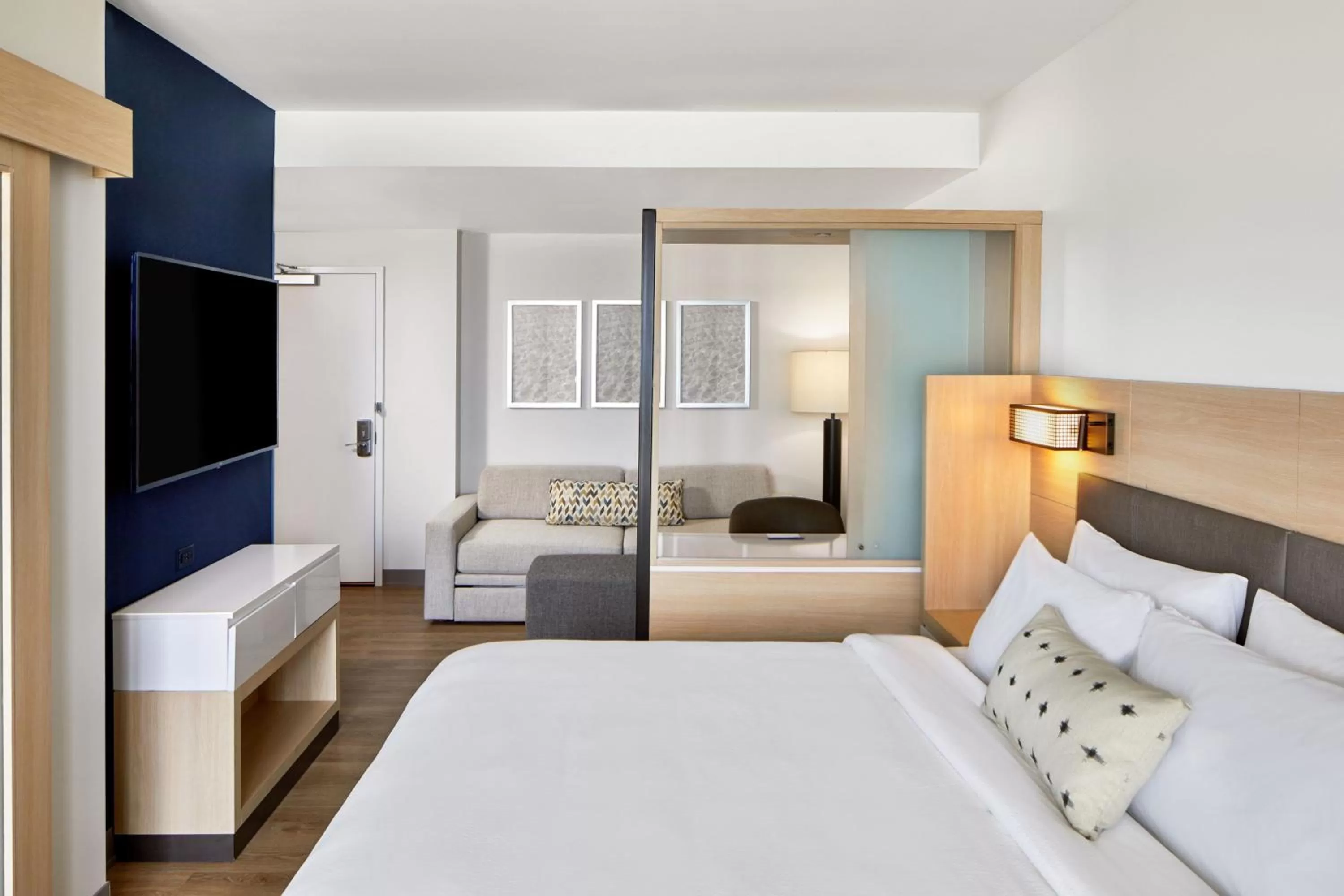 Photo of the whole room, Bed in SpringHill Suites by Marriott Jacksonville Beach Oceanfront