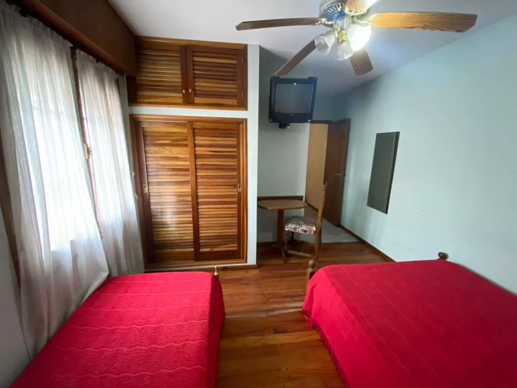 Photo of the whole room, TV/Entertainment Center in Hotel Villa Inés Mendoza