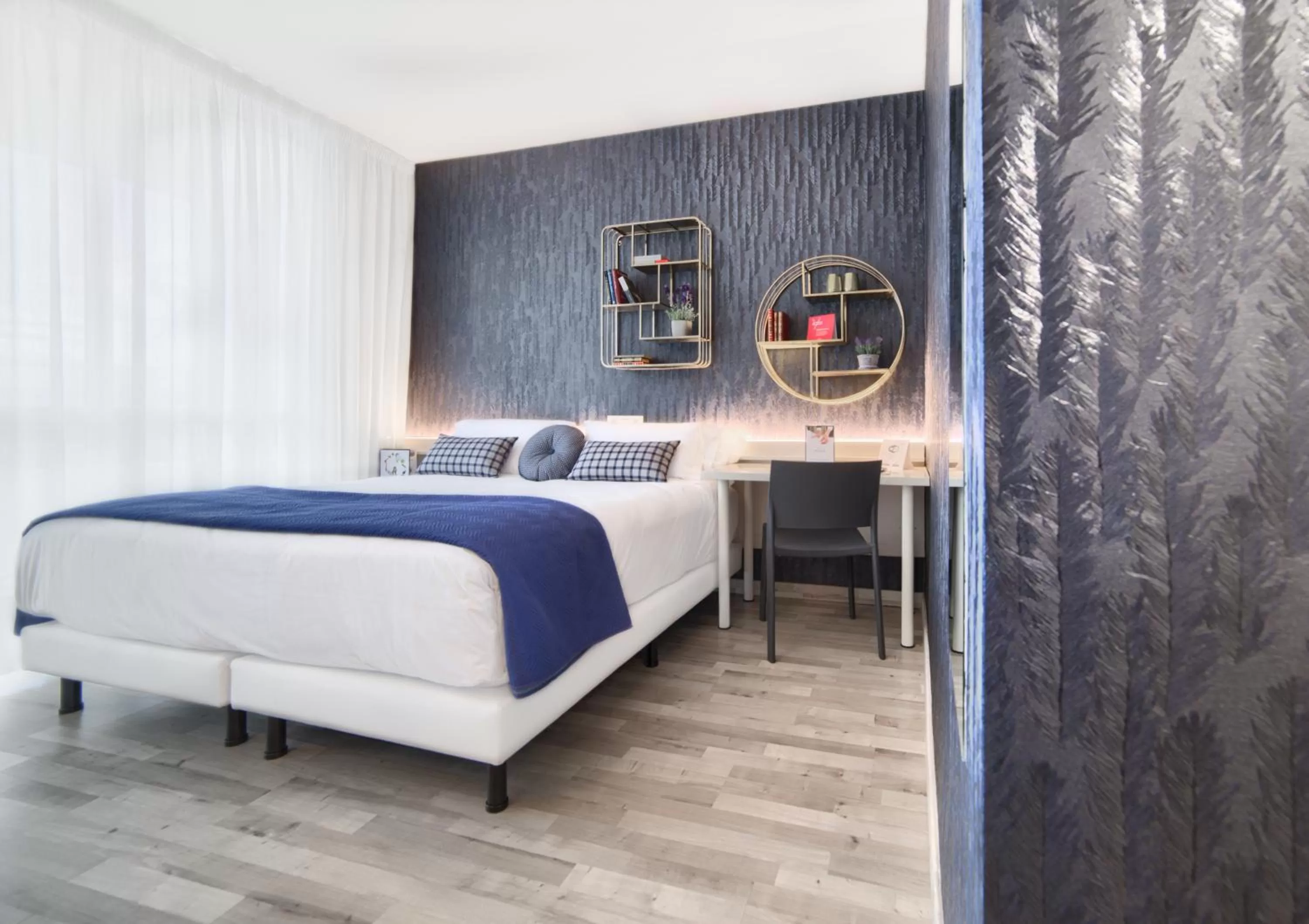 Bed in Hotel Luze El Villa