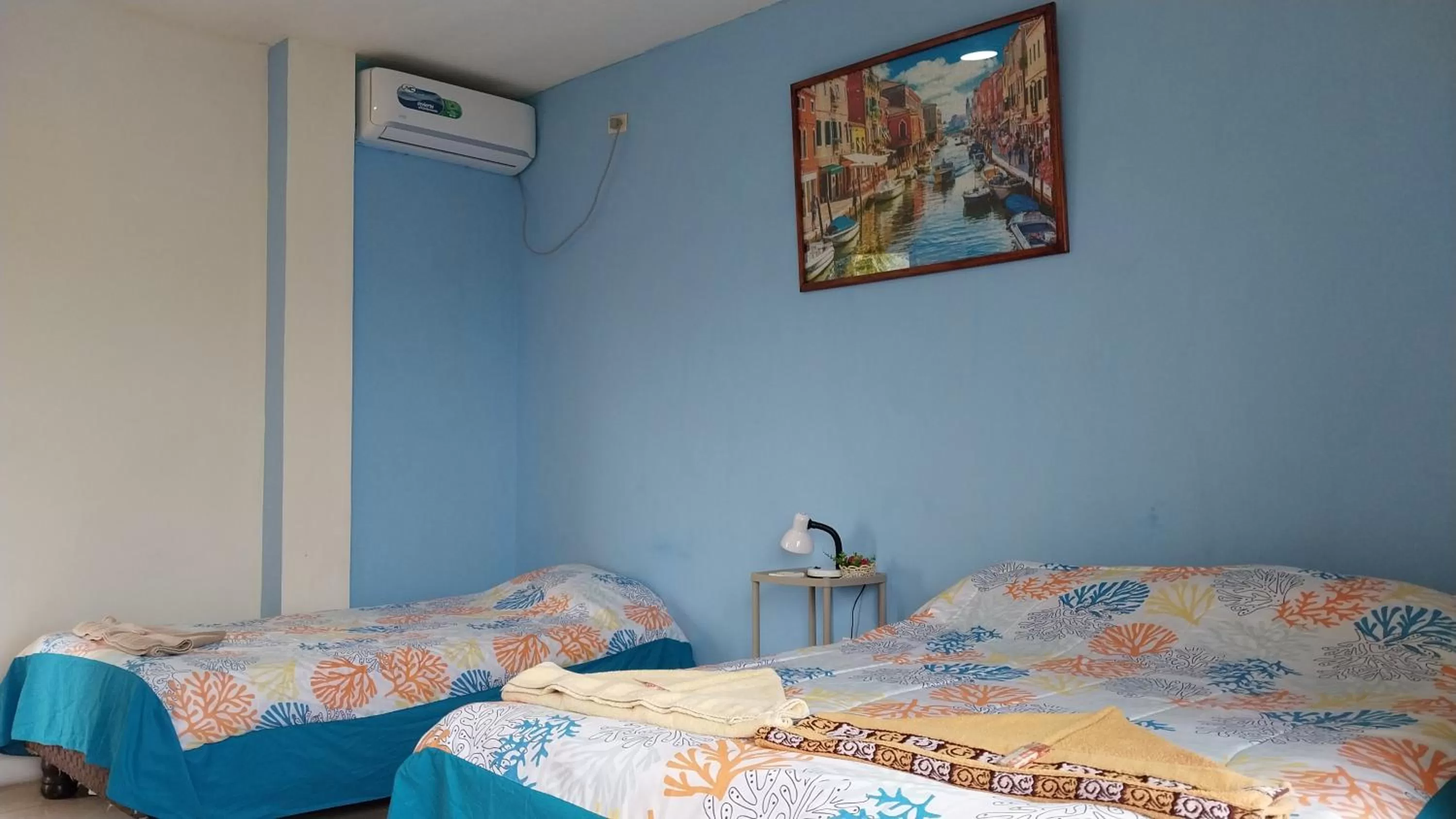 Bed in Hostal Cabañas Don Jorge