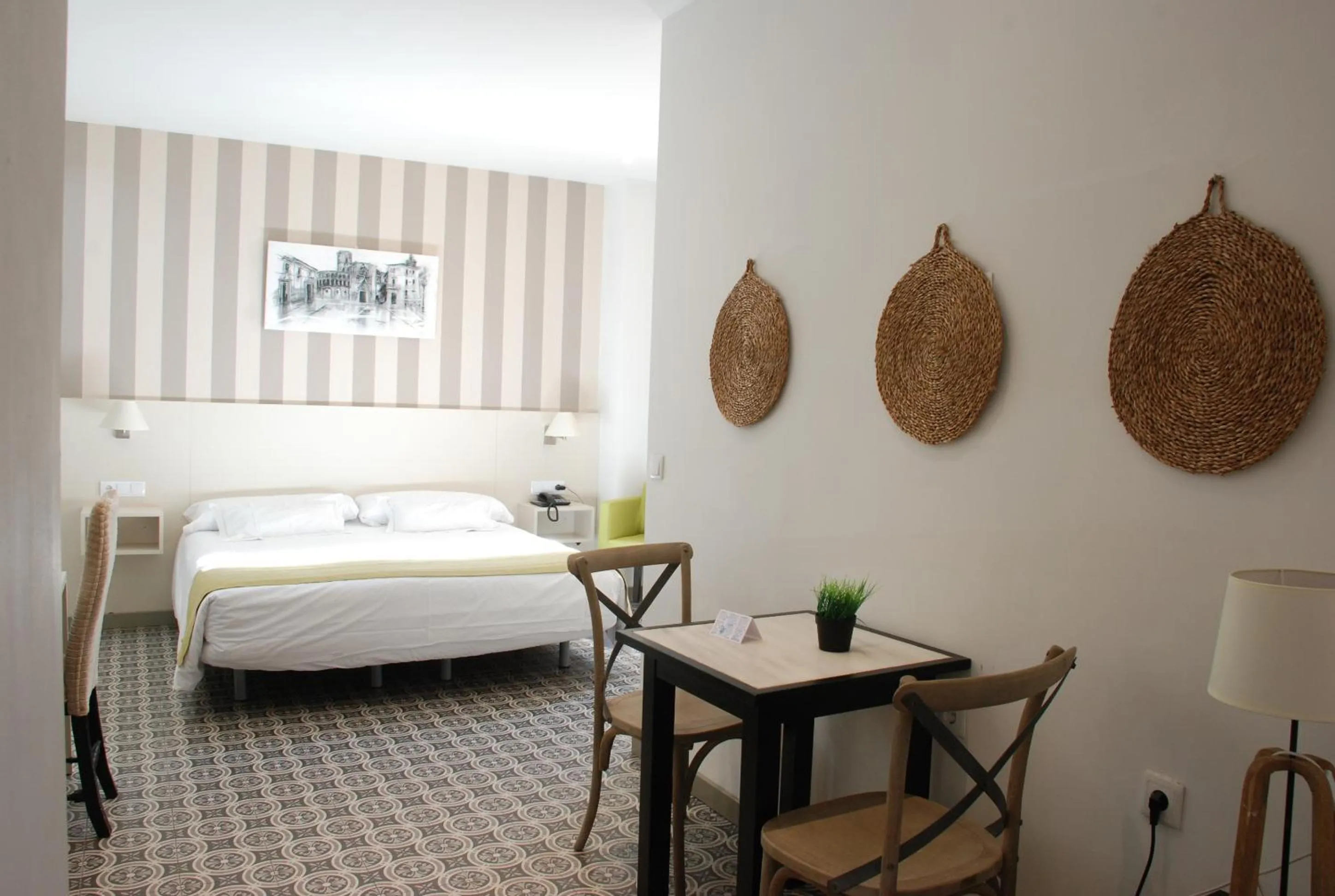 Bed in Hotel San Lorenzo Boutique Plaza