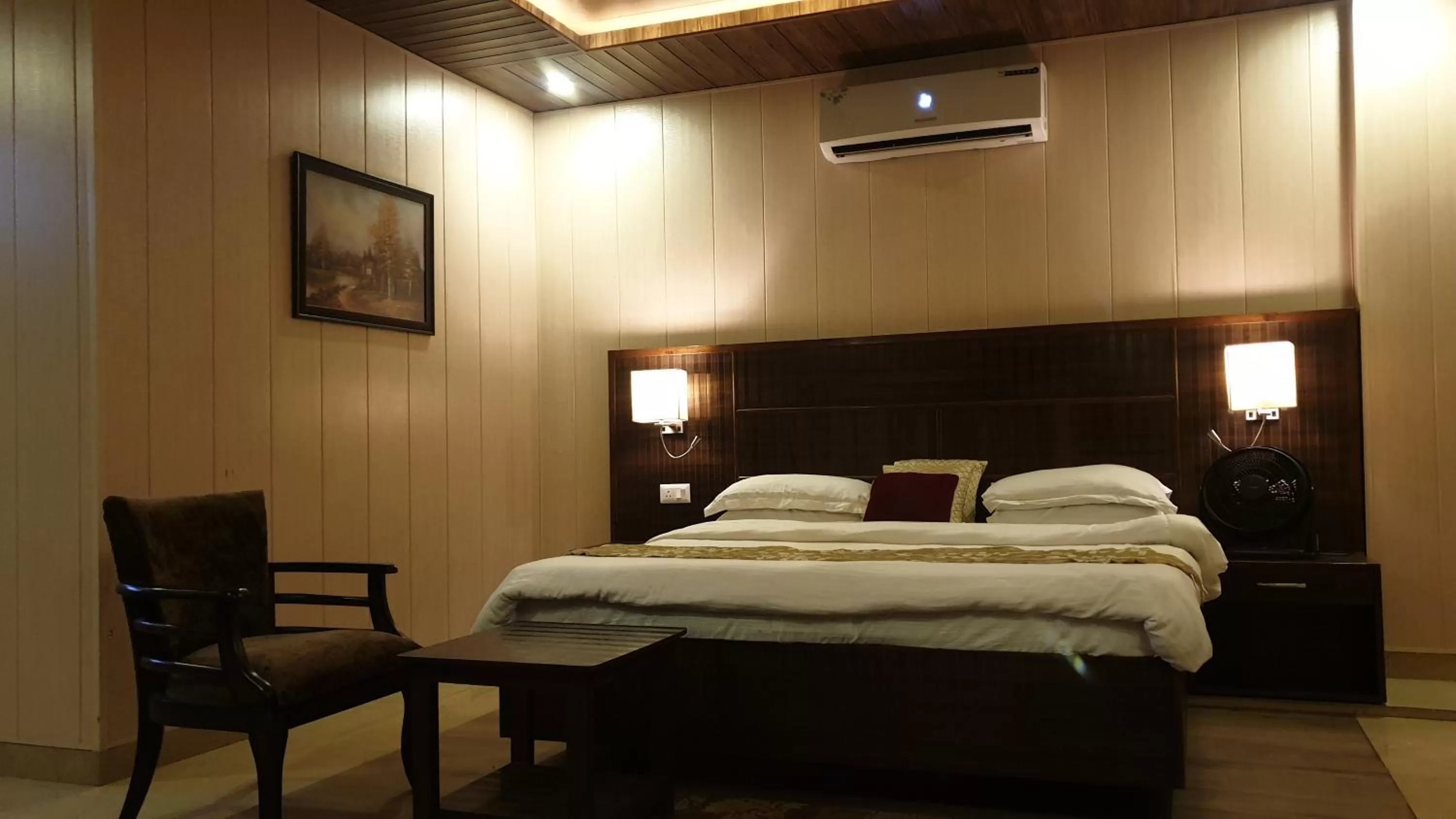 Bed in Maple Leaf Hotel