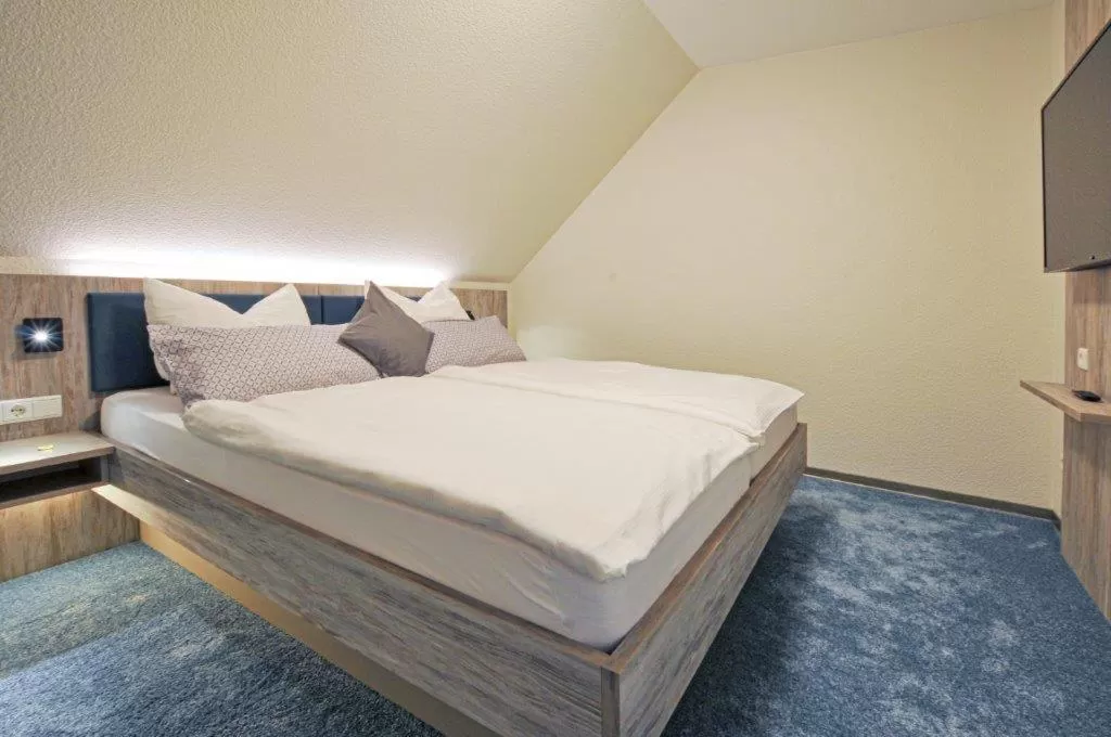 Bed in Hotel Grasberger Hof GmbH