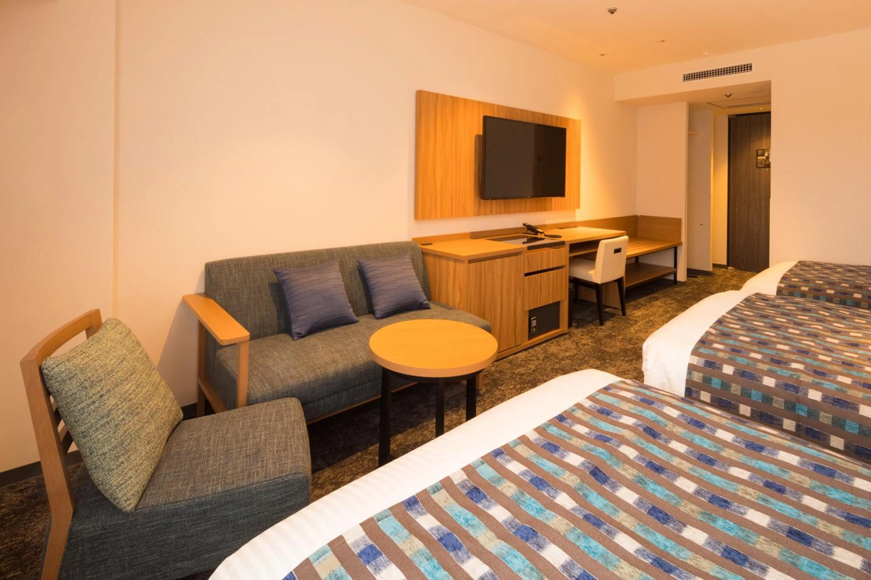 Photo of the whole room, Seating Area in Hotel Higashinihon Morioka