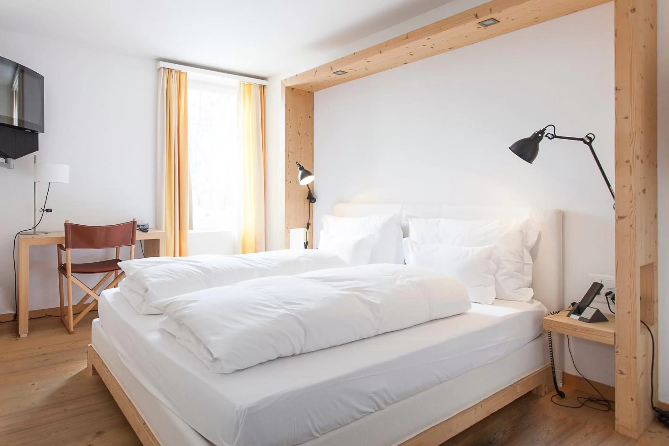 Bed in Hotel Müller - mountain lodge