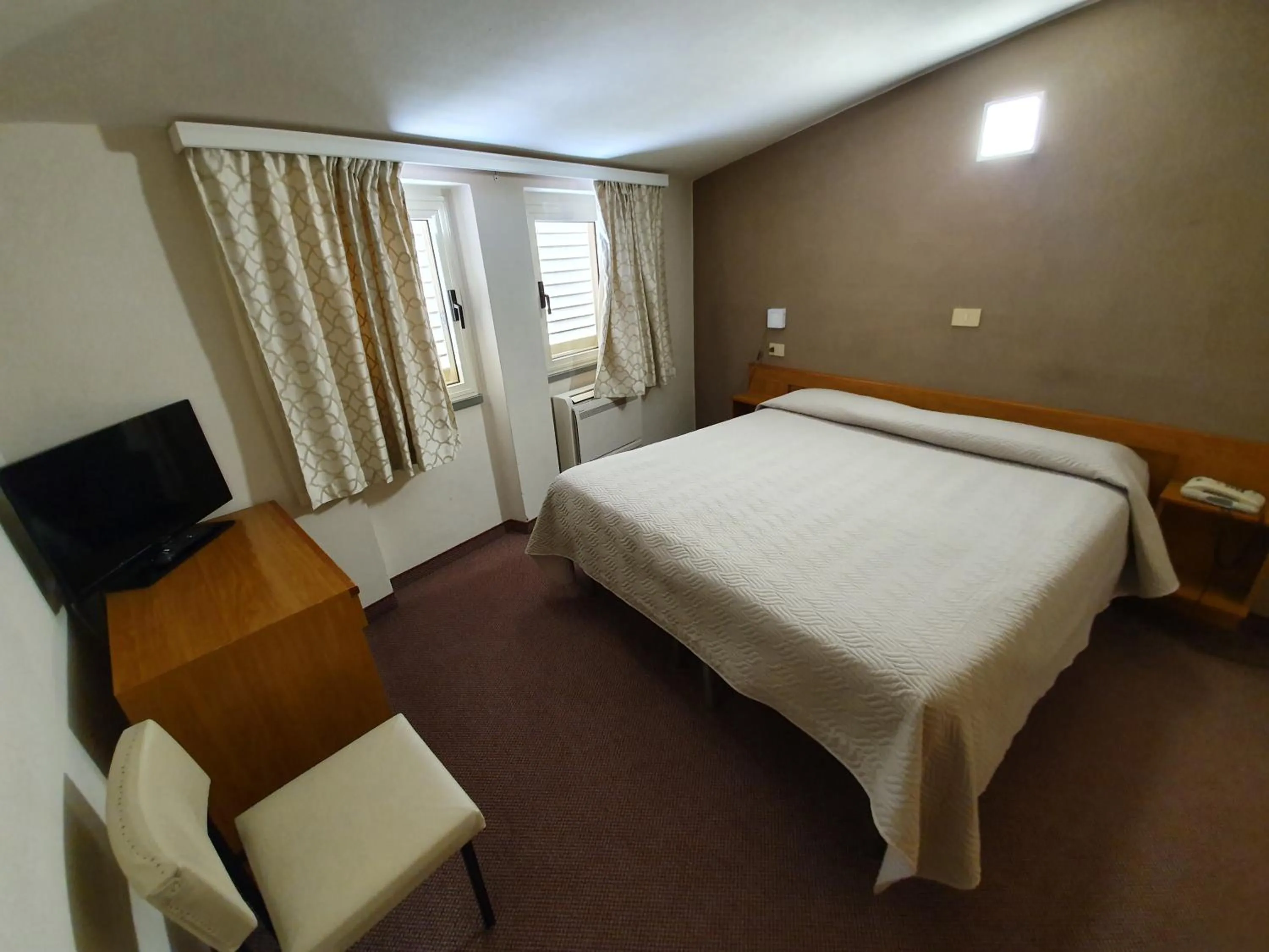 Bedroom in Hotel Giovanna